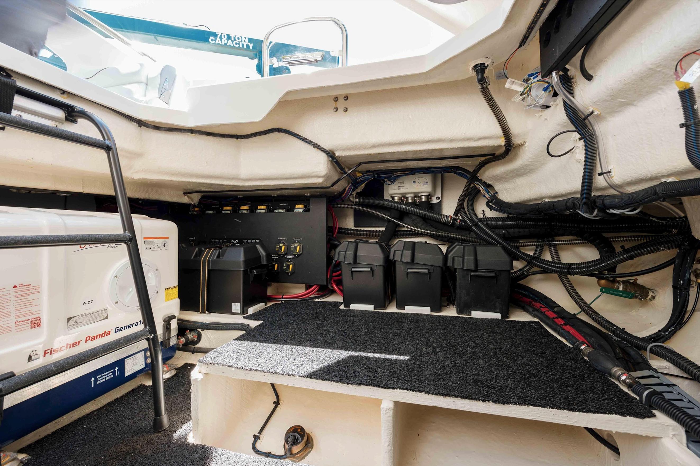 2022 Regal LX36 boat interior showing battery compartment and wiring setup.