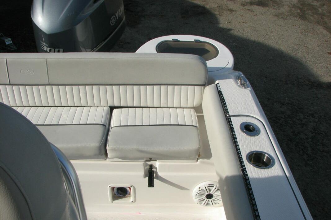 2020 Sea Fox 249 Avenger boat interior with cushioned seating and Yamaha engine.