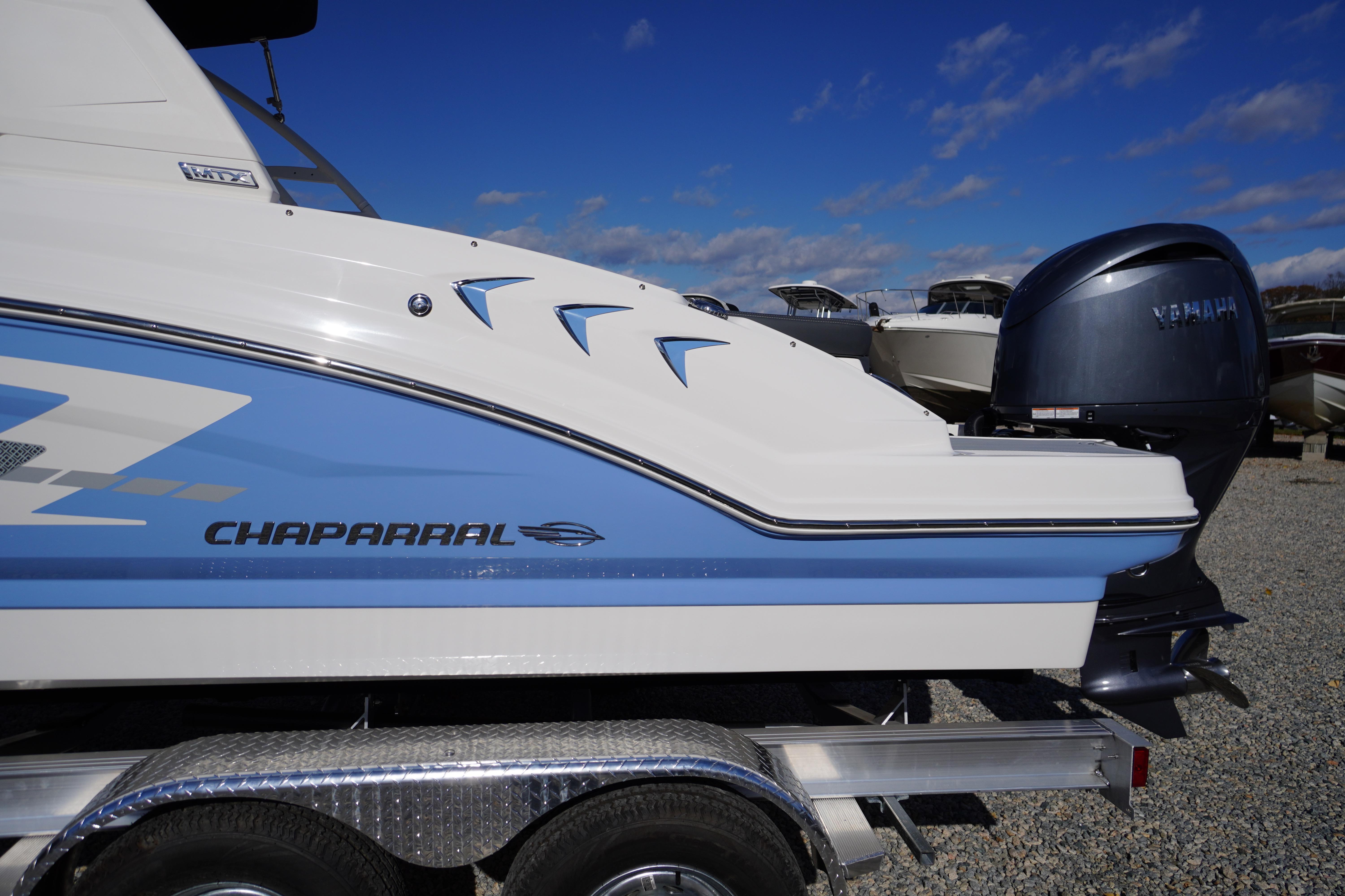 2026 Chaparral 23 SSi OB boat with Yamaha outboard motor on trailer.