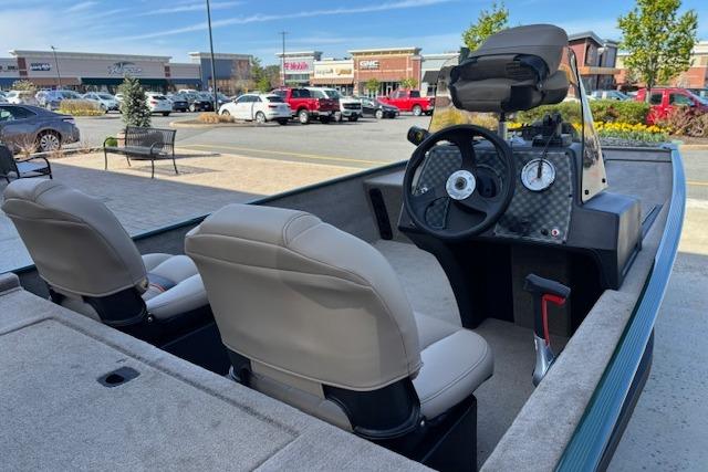 2026 Tracker Bass Tracker Classic Limited boat interior with dual seats and steering console.