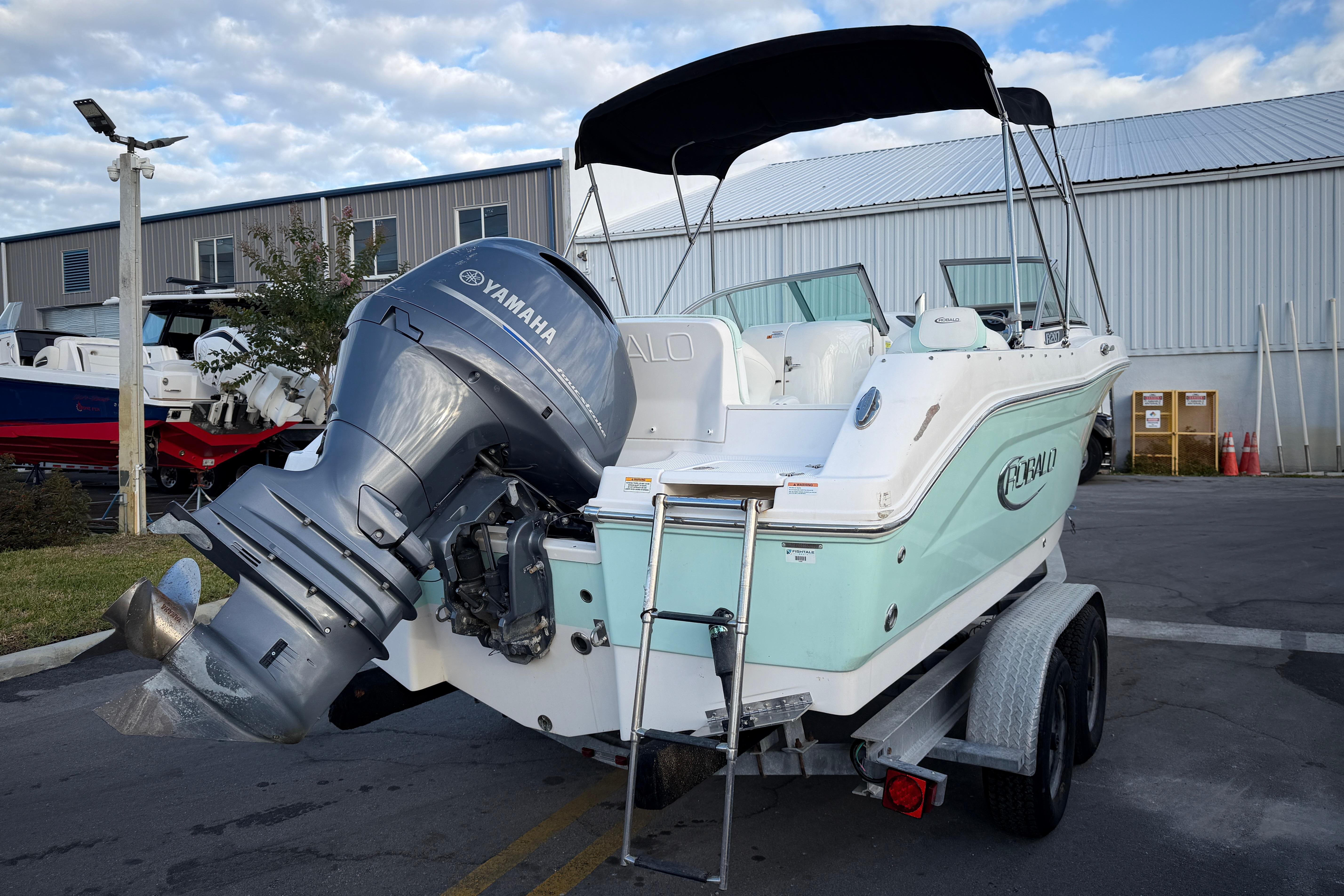 2020 Robalo R207 Dual Console boat with Yamaha engine on trailer.