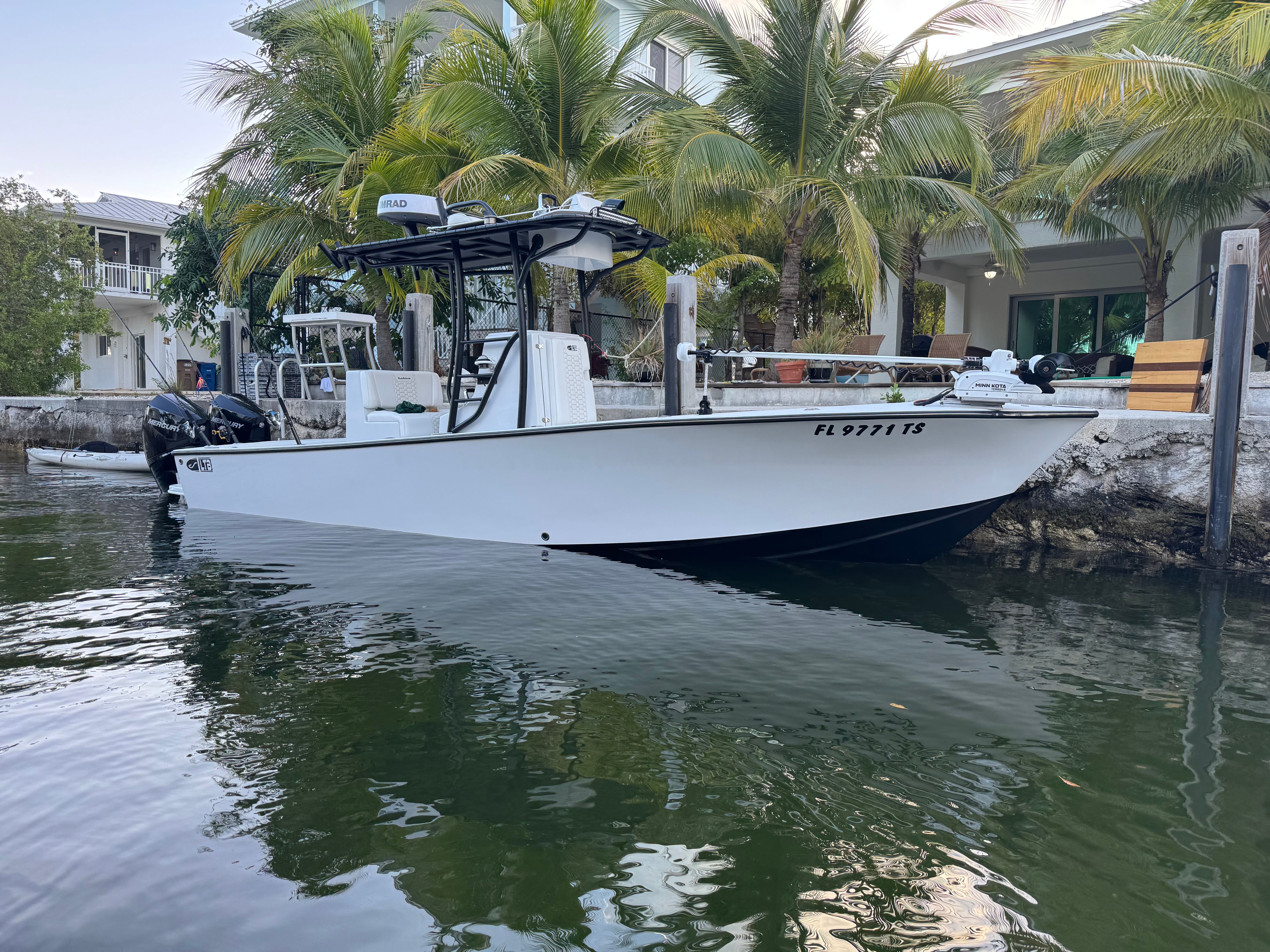 2024 Latitude Tournament Boats 25' CC in tropical setting.