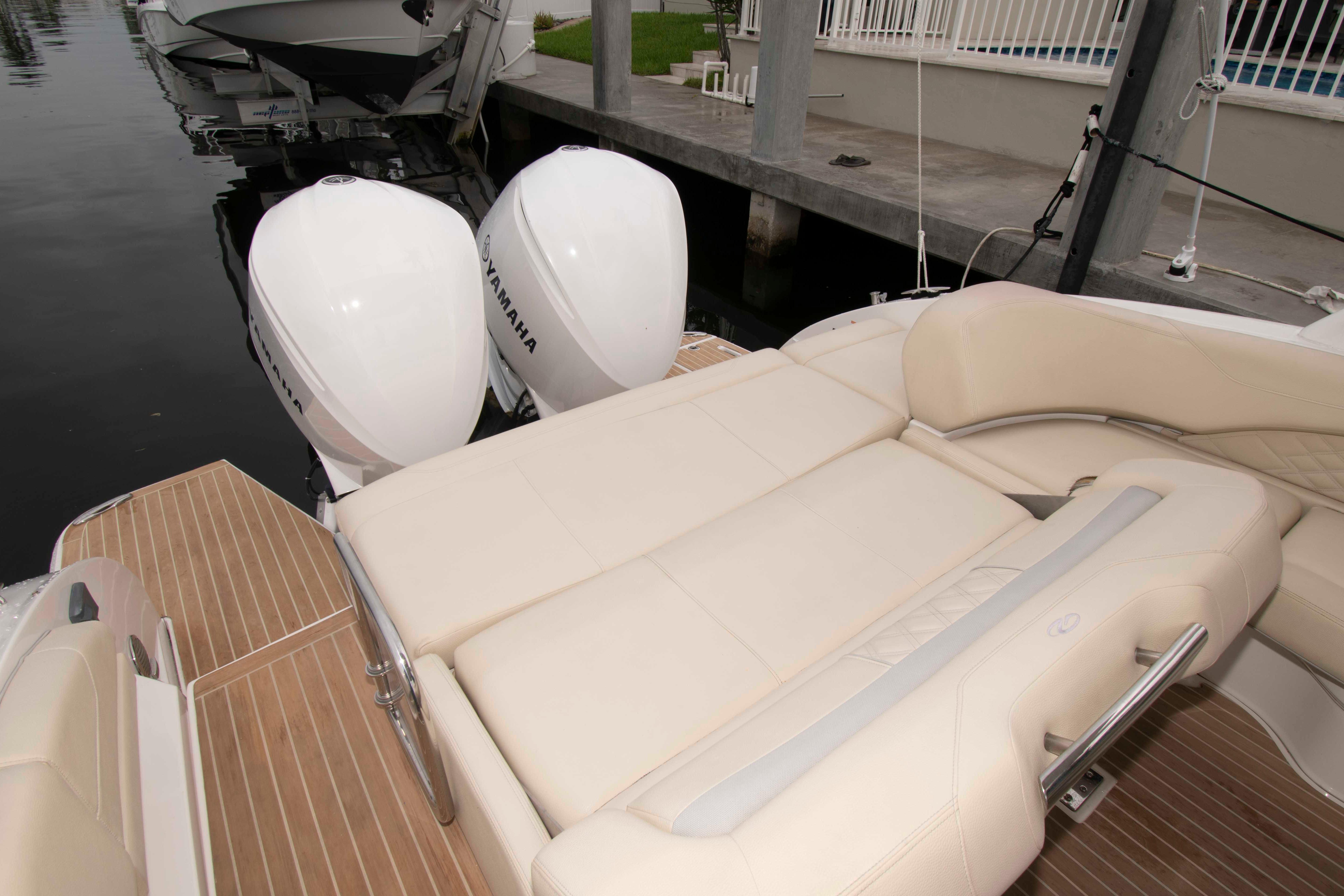 2019 Regal 33 OBX boat with Yamaha outboard engines and luxurious seating.