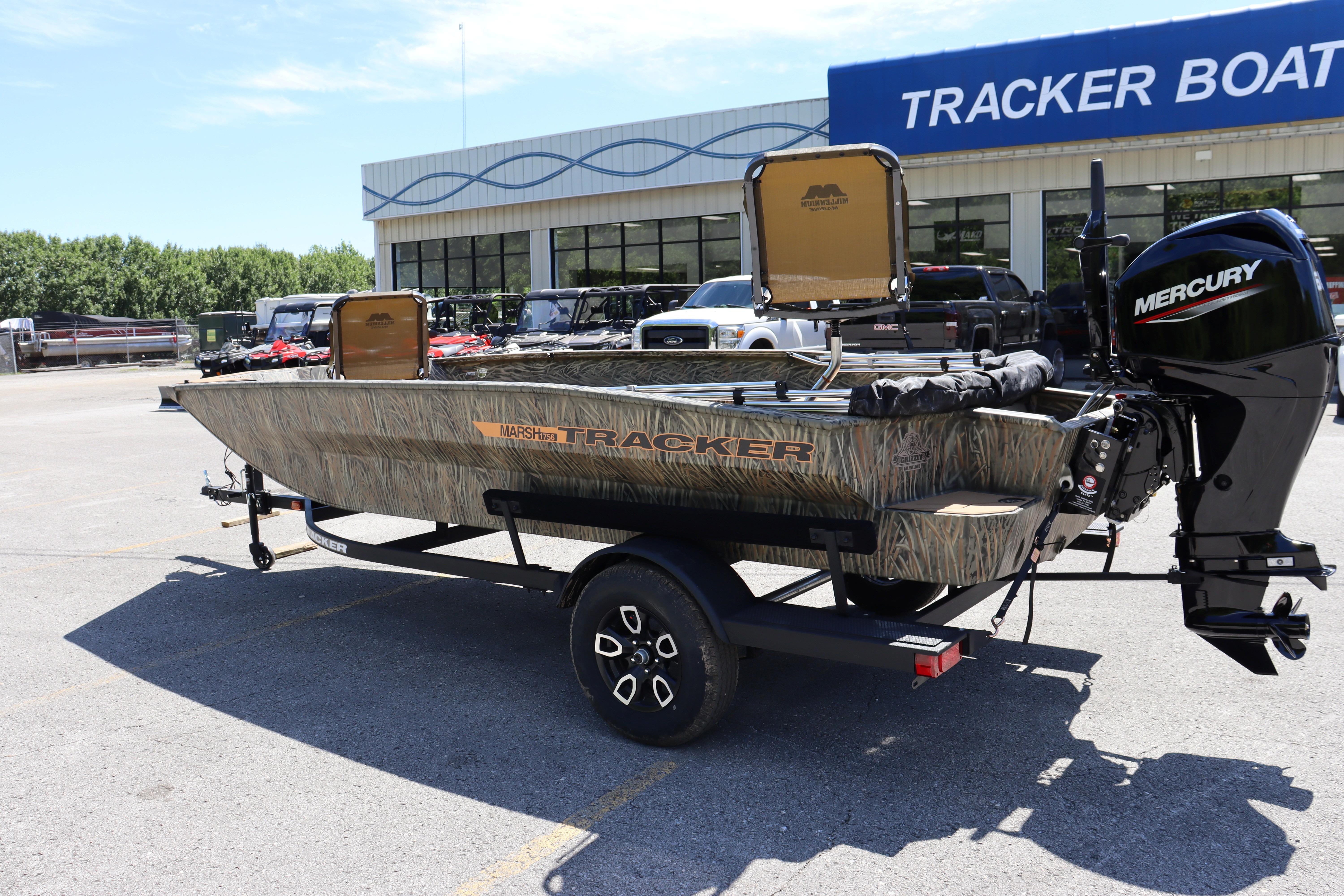 2026 Tracker Grizzly 1756 T Marsh boat with Mercury engine at dealership.