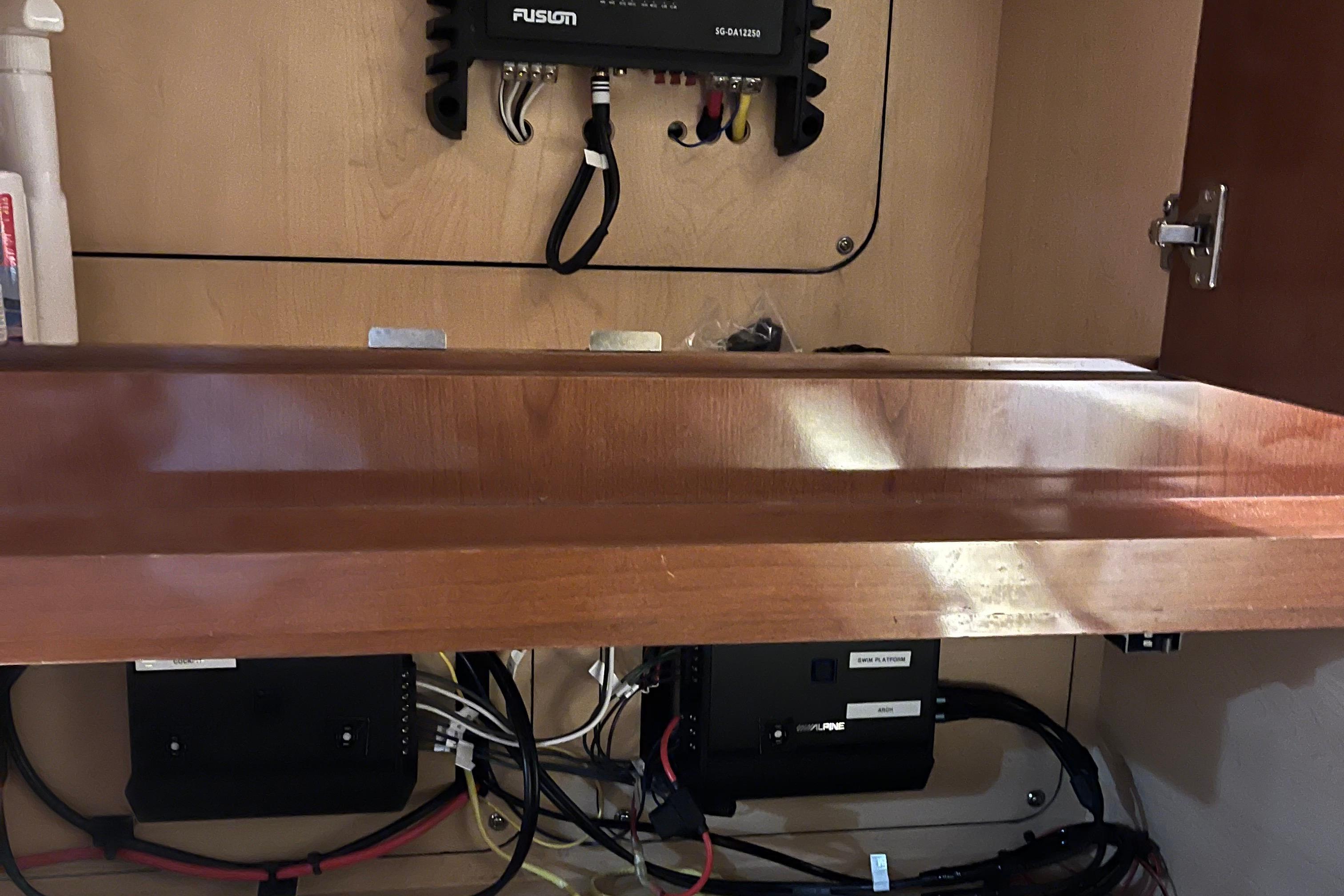 Interior view of a 2008 Sea Ray 350 Sundancer with electronic components and wiring.
