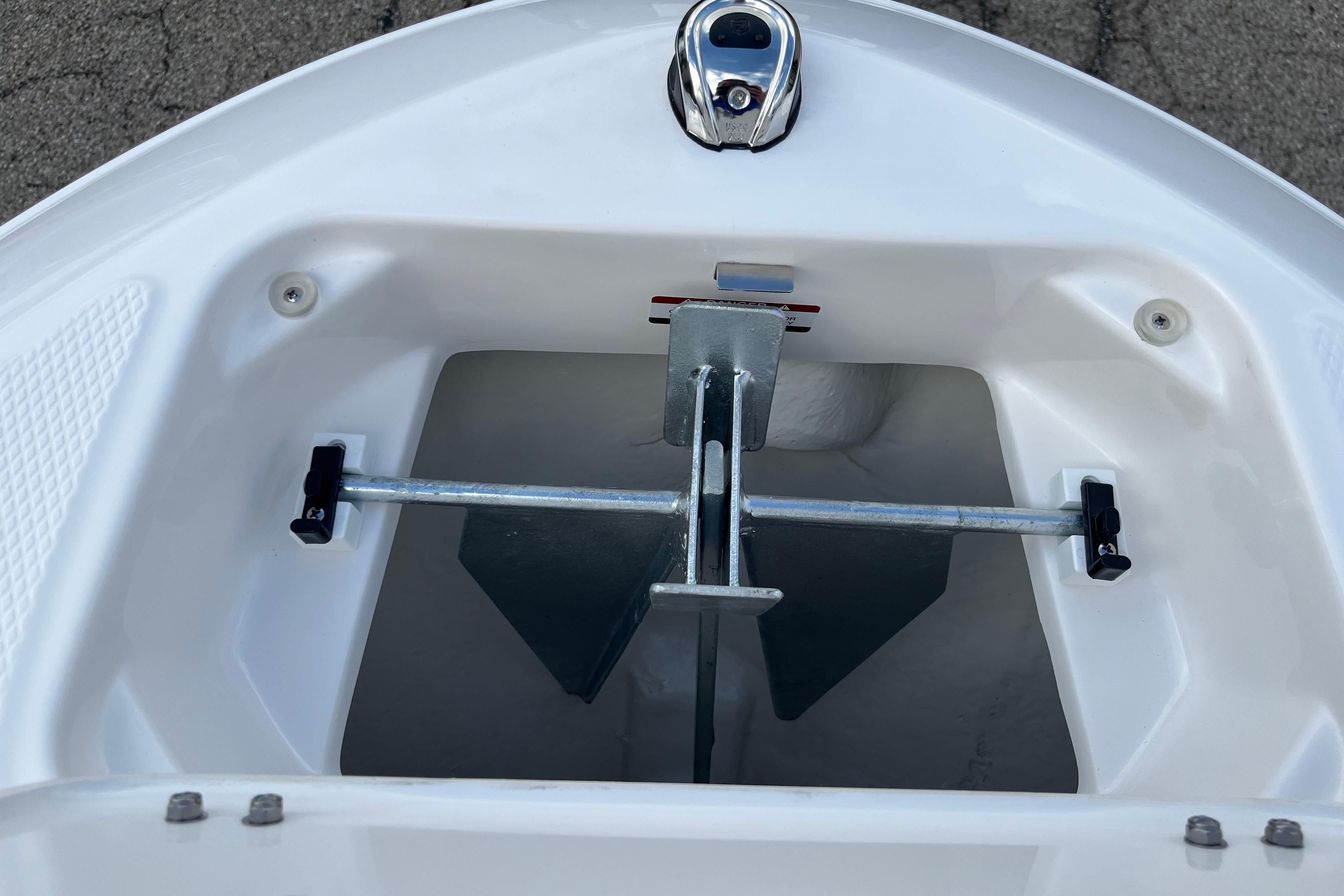 Anchor compartment of 2026 Chaparral 21 SSi boat, featuring secure storage.