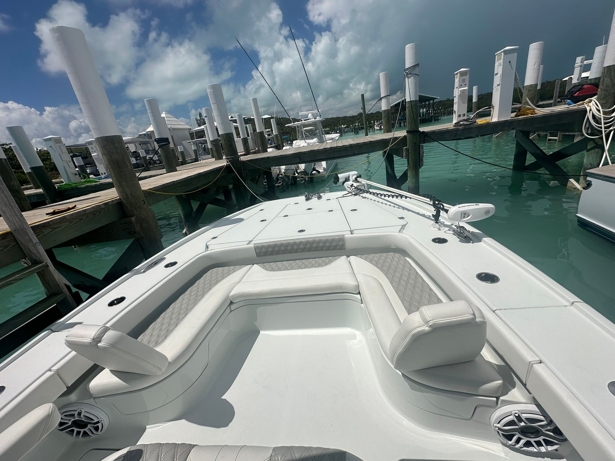 Freeman 28 boat from 2024 docked with clear water view.