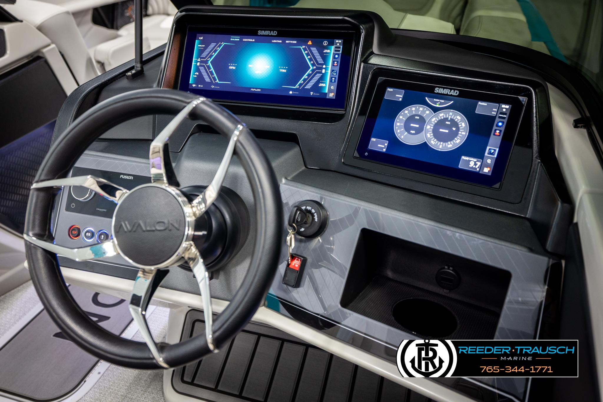 Steering console of 2025 Avalon 2585 Excal VRBW with digital displays and controls.