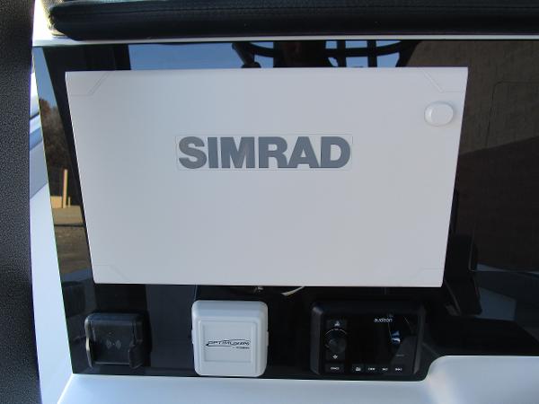 Simrad navigation system on 2025 Sea Pro 292 Offshore boat dashboard.