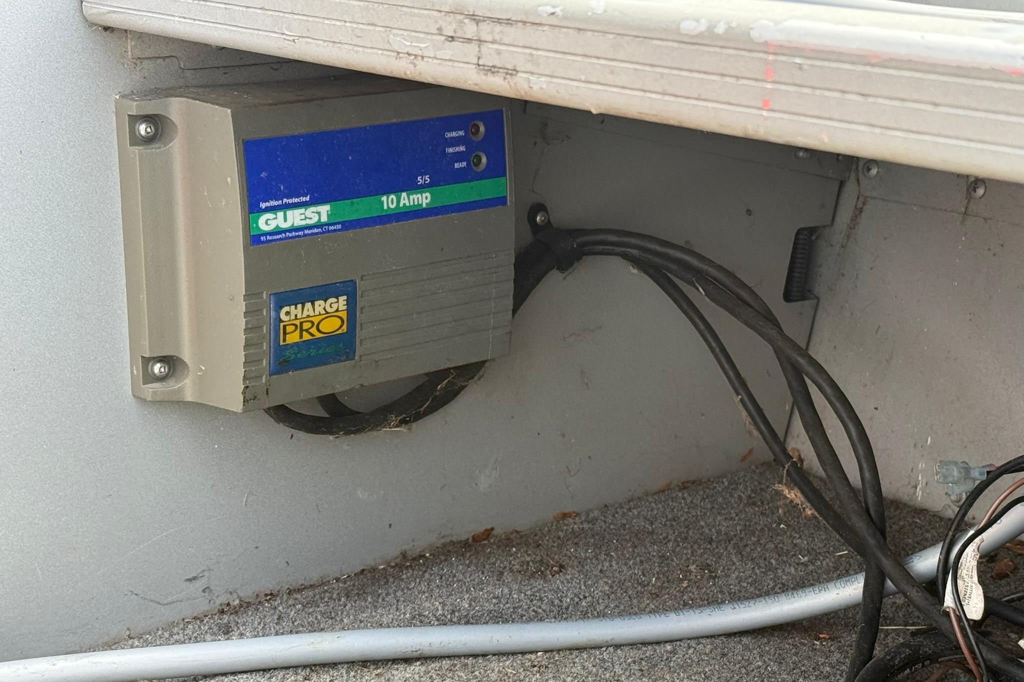 Onboard battery charger in a 2013 Alumacraft Fisherman 160 Tiller boat.