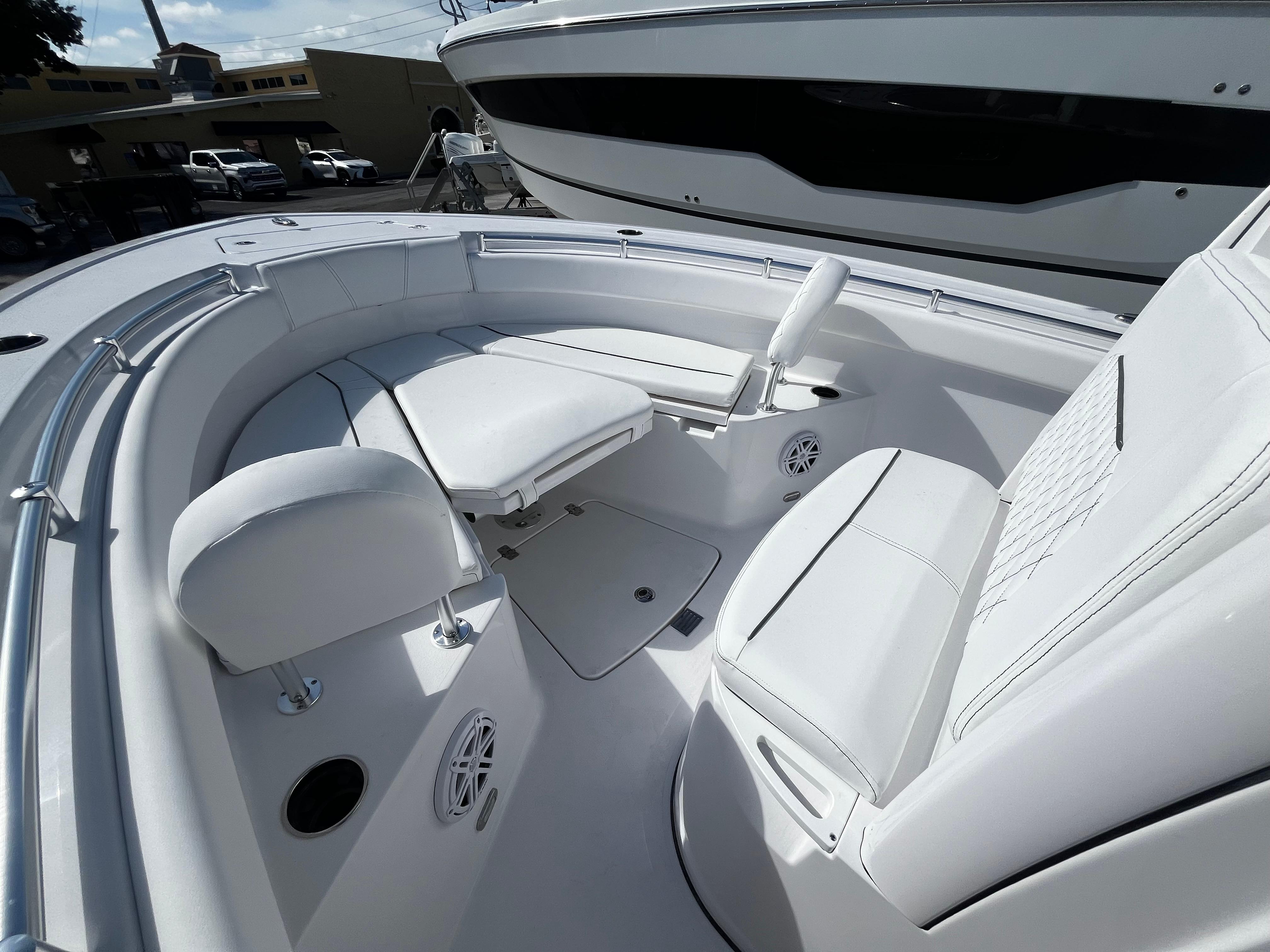 2026 Sportsman Open 212 Center Console boat interior with white seating and modern design.