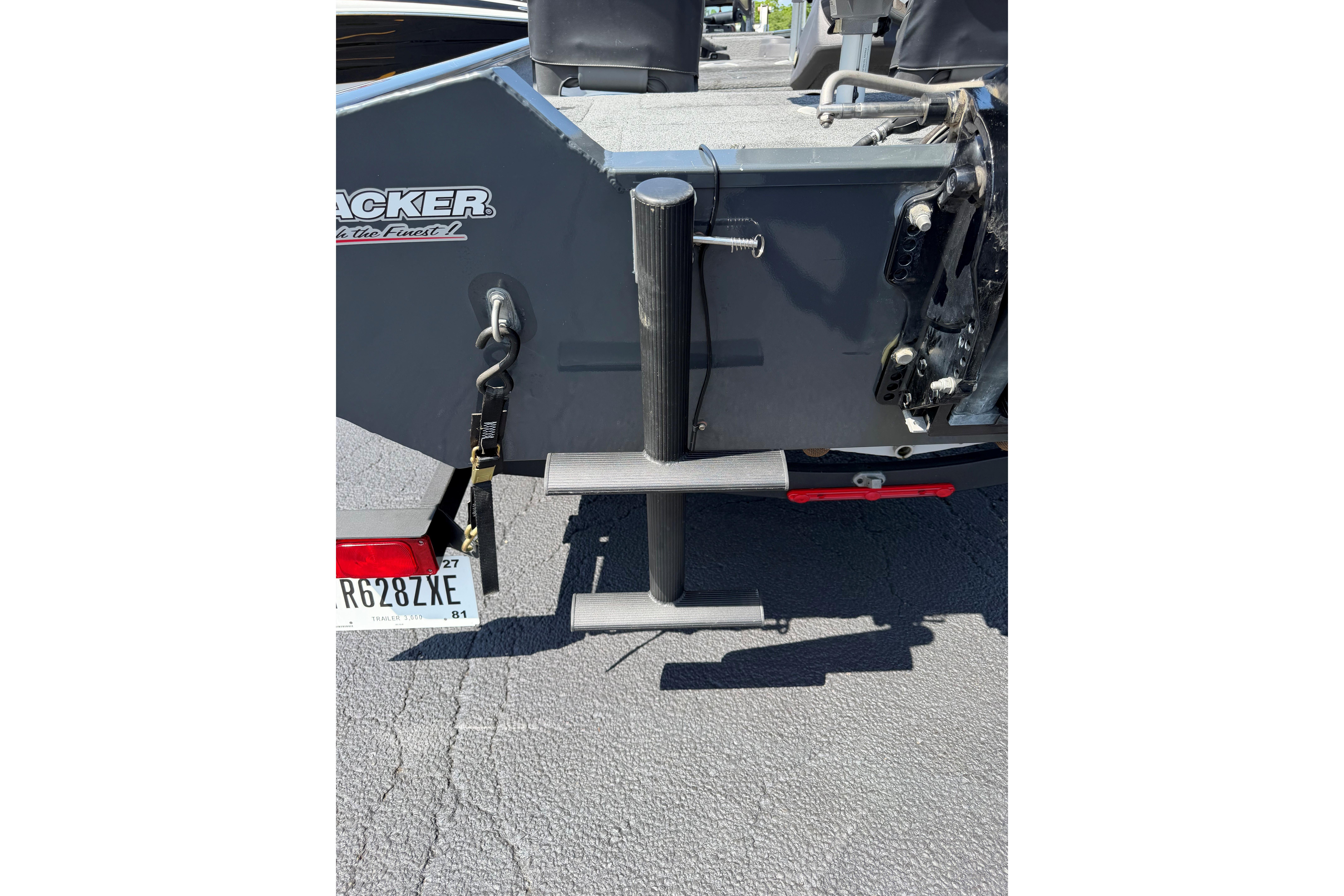 2019 Tracker Pro Team 175 TF boat rear view with trailer and license plate.