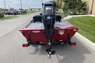 2026 Tracker Bass Tracker Classic XL boat with 50 HP motor, parked outdoors.