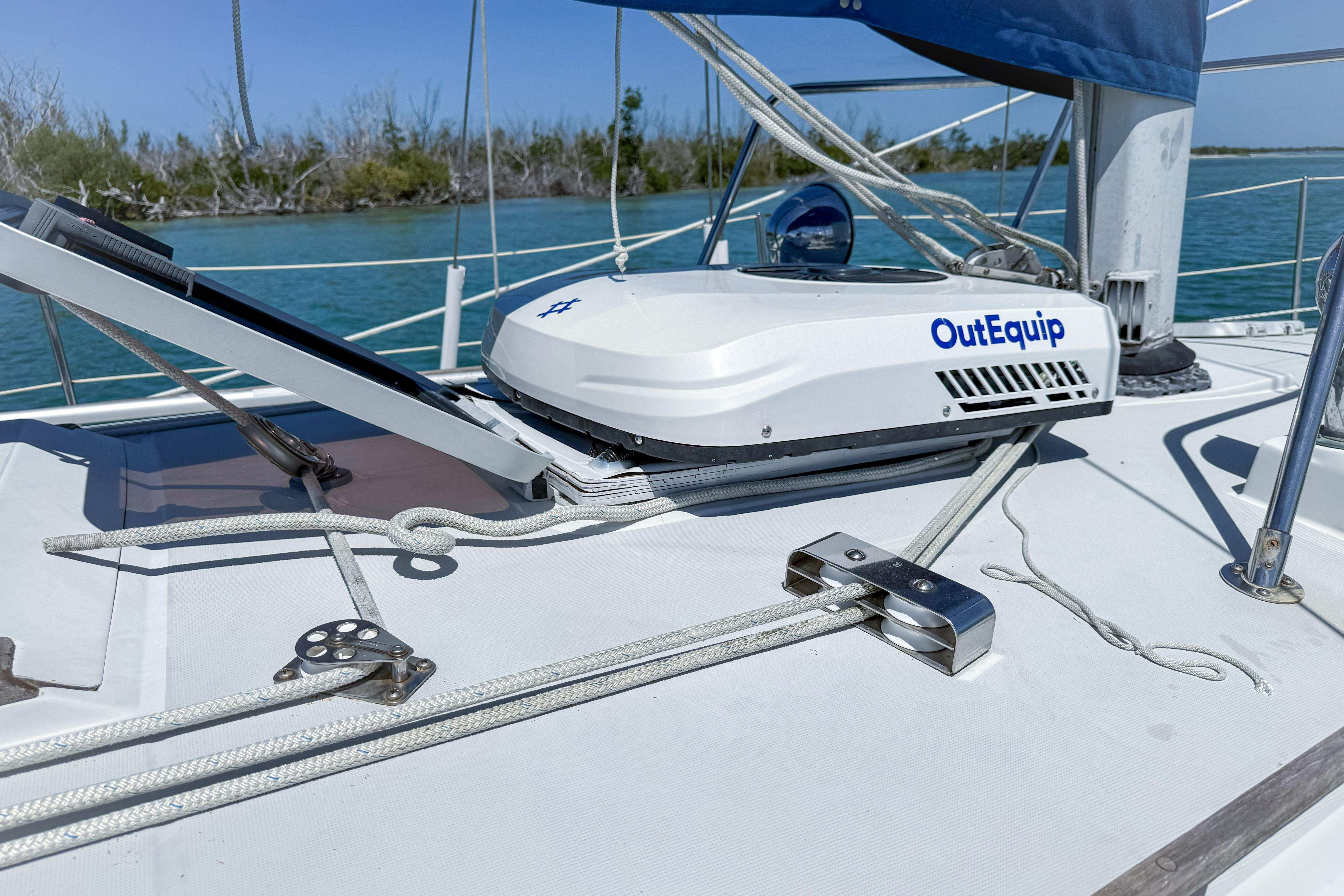 Sailboat deck with OutEquip equipment, Oday 40 model, 1988, on calm waters.