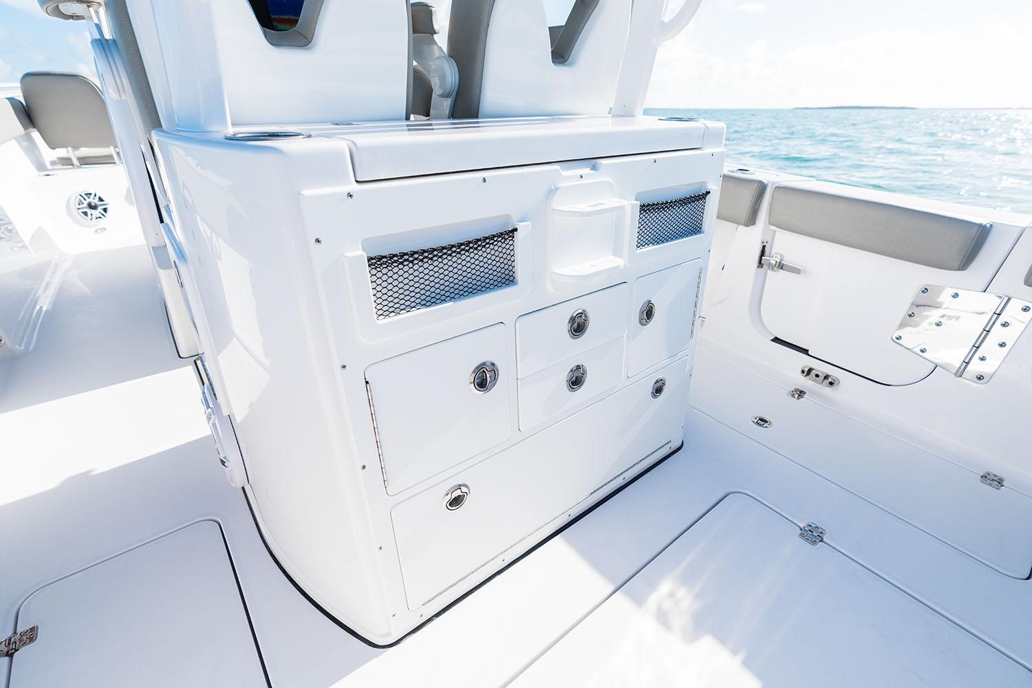 Manufacturer Provided Image: 2025 Sportsman Open 282 Center Console boat interior with storage compartments.