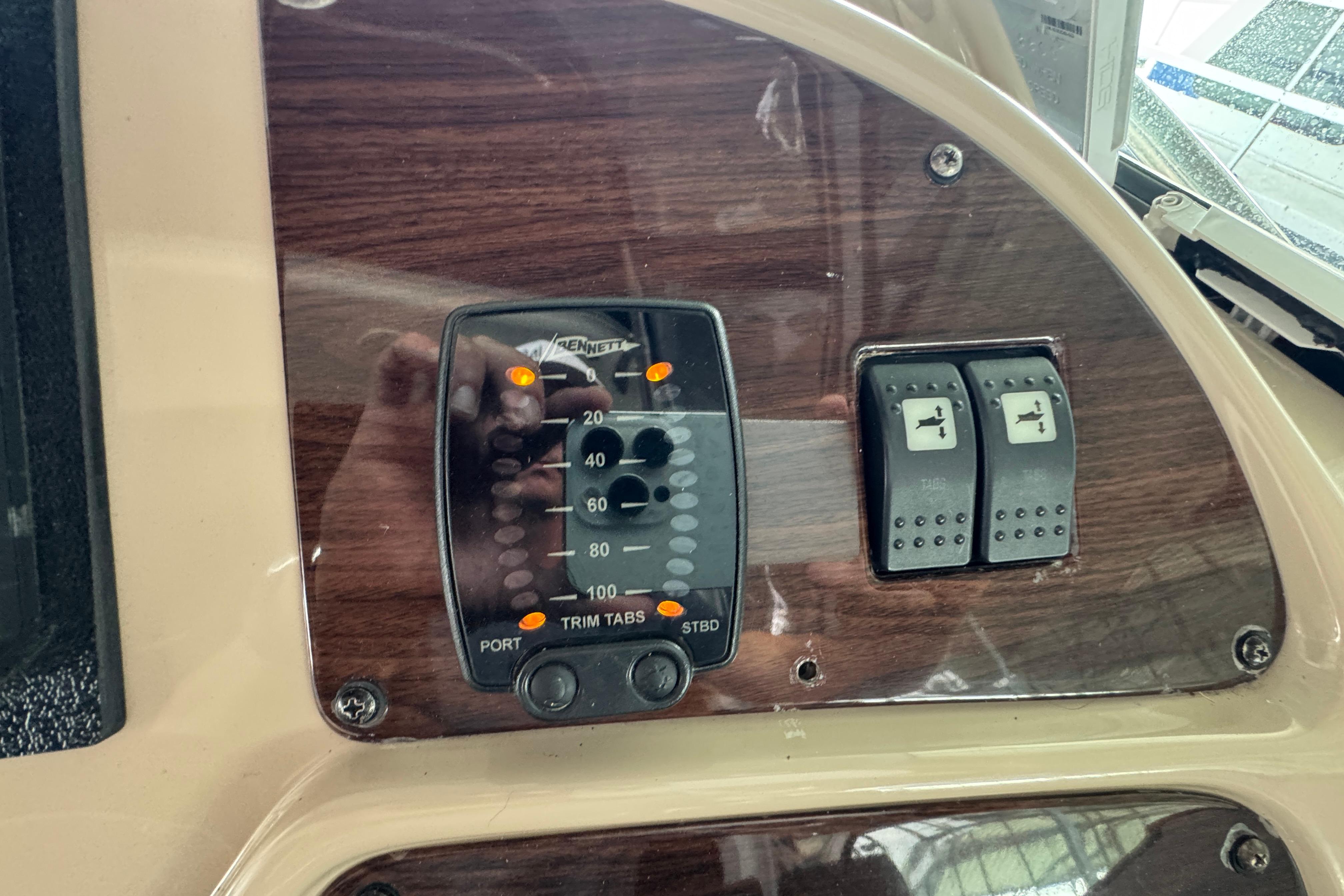 Control panel of a 2006 Chaparral 330 Signature boat with trim tab indicators.