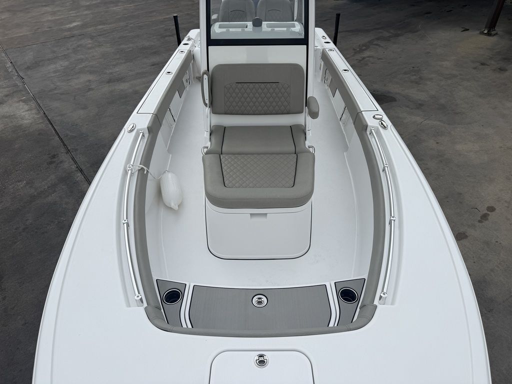 The image shows the bow of a 2025 Sportsman Masters 247OE Bay Boat with seating.