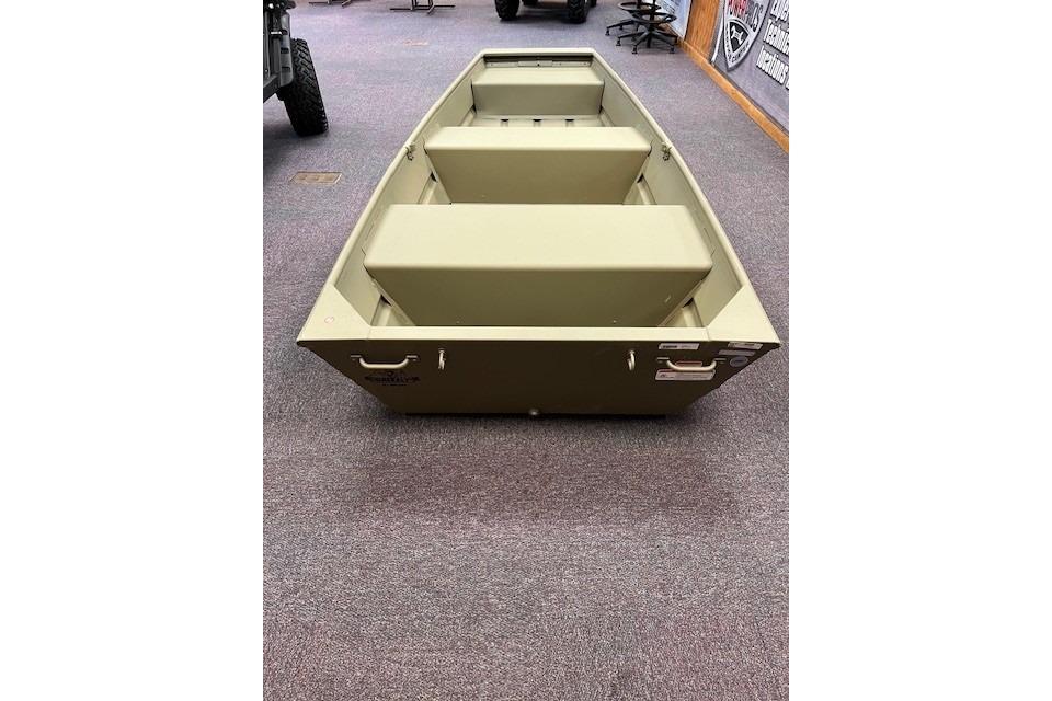 2026 Tracker Grizzly 10 Jon boat displayed indoors on carpeted floor.