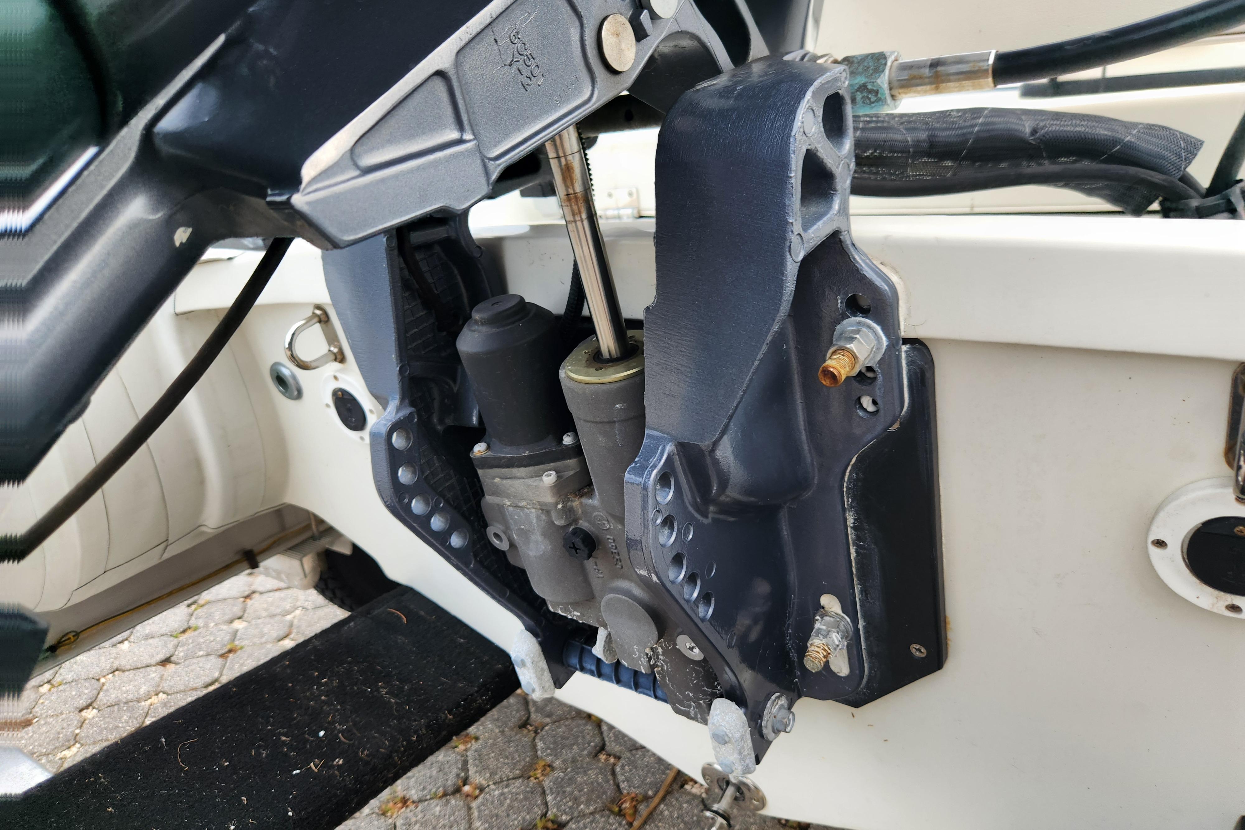 Close-up of a 2019 Novurania DL 400 boat engine mount and hydraulic system.