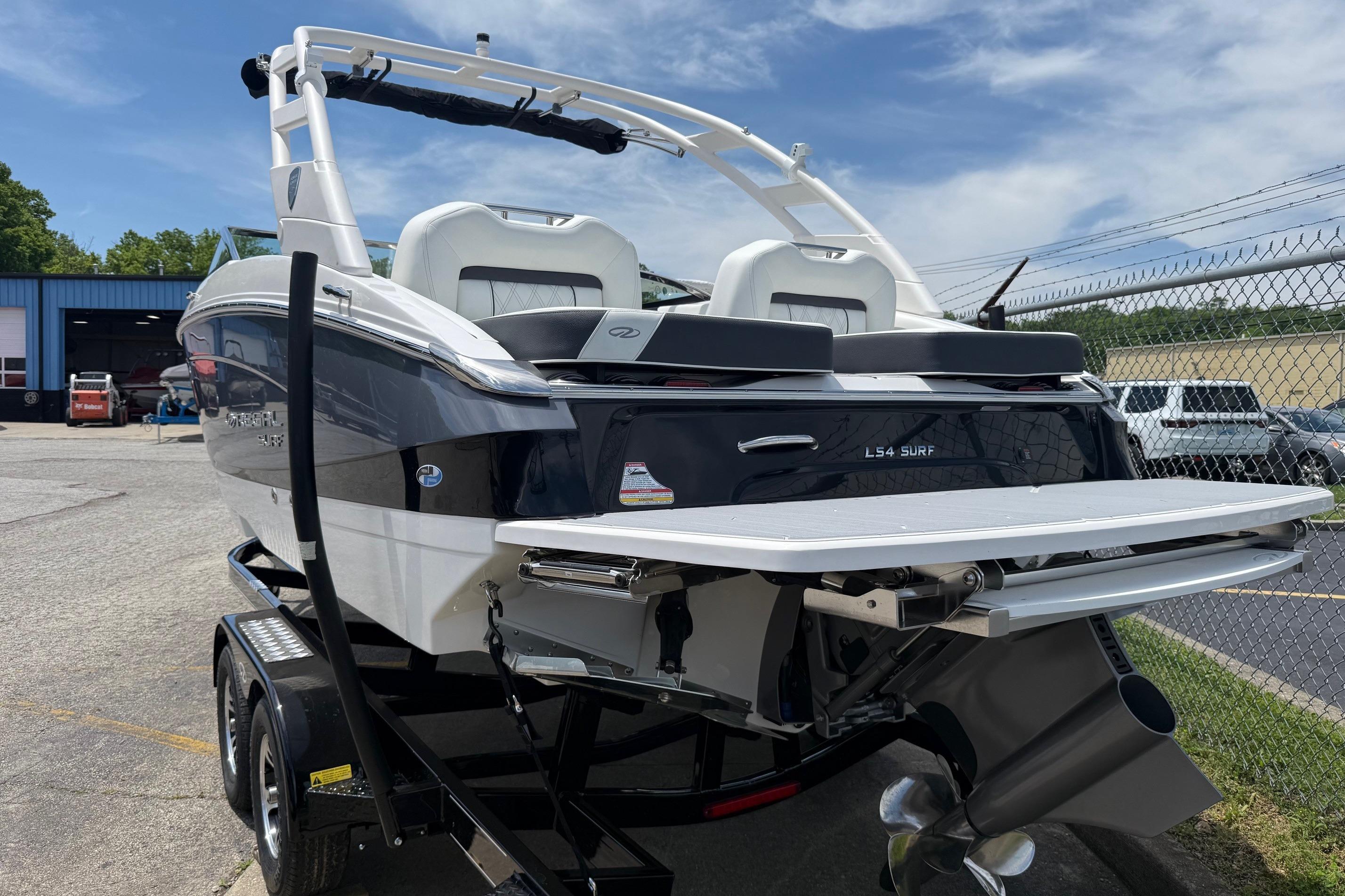 2026 Regal LS4 Surf boat on trailer, showcasing sleek design and advanced features.