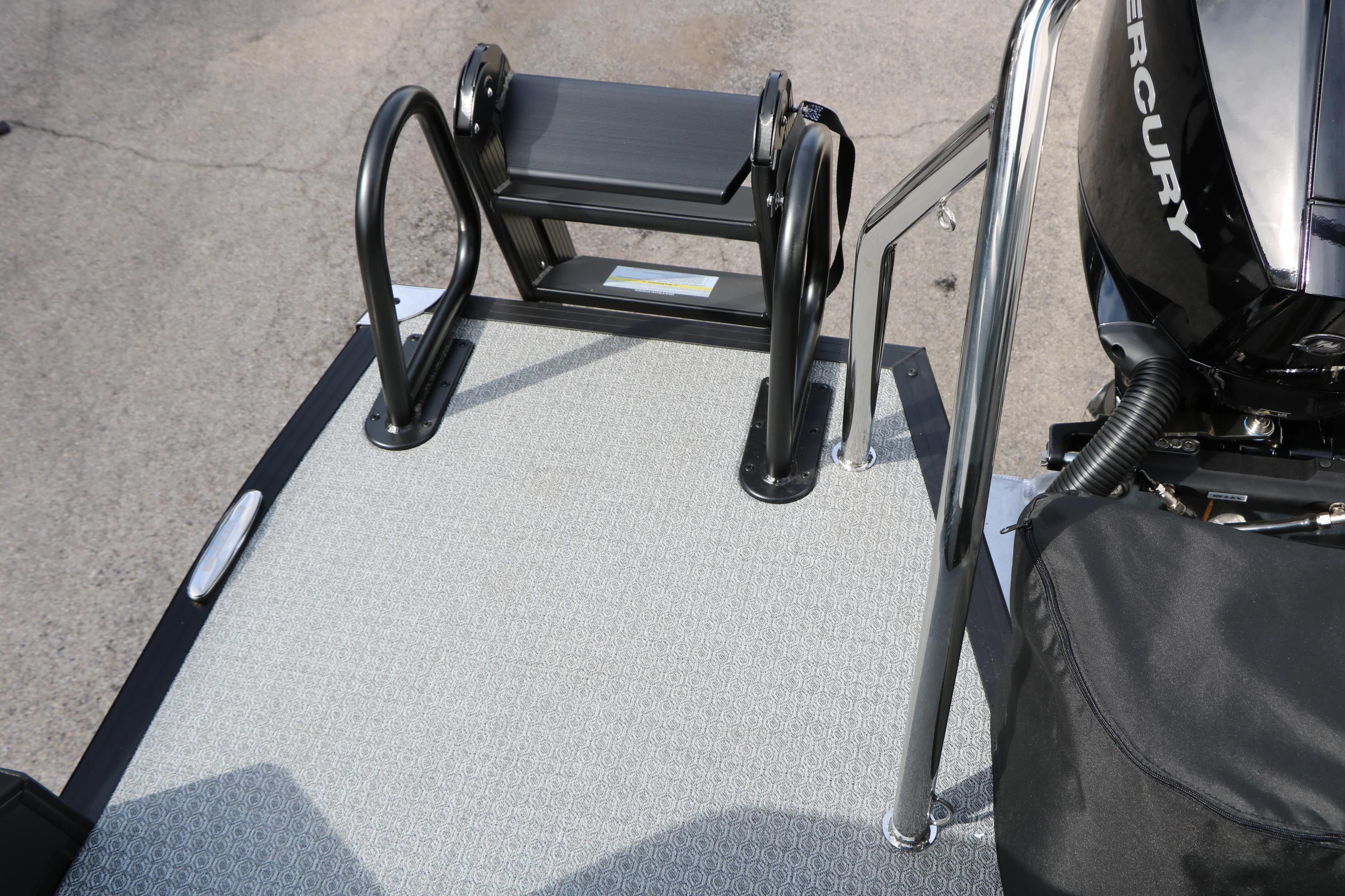 Rear deck of 2026 Evotti 521QL boat with ladder and Mercury engine.