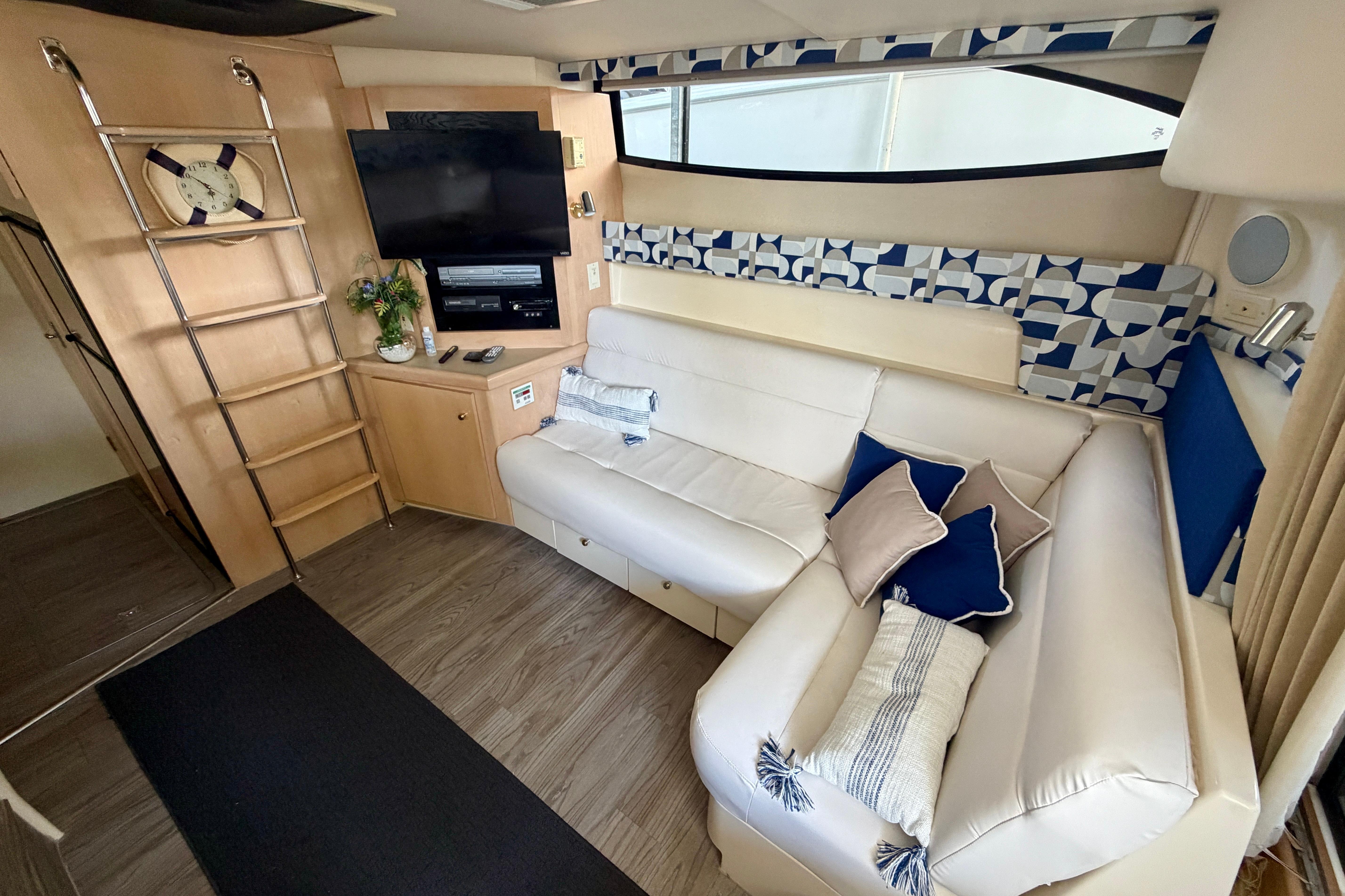 Interior of 2000 Carver 350 Mariner yacht with modern decor and comfortable seating.