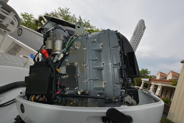 2021 Sea Pro 228 Bay boat engine, detailed view of internal components.