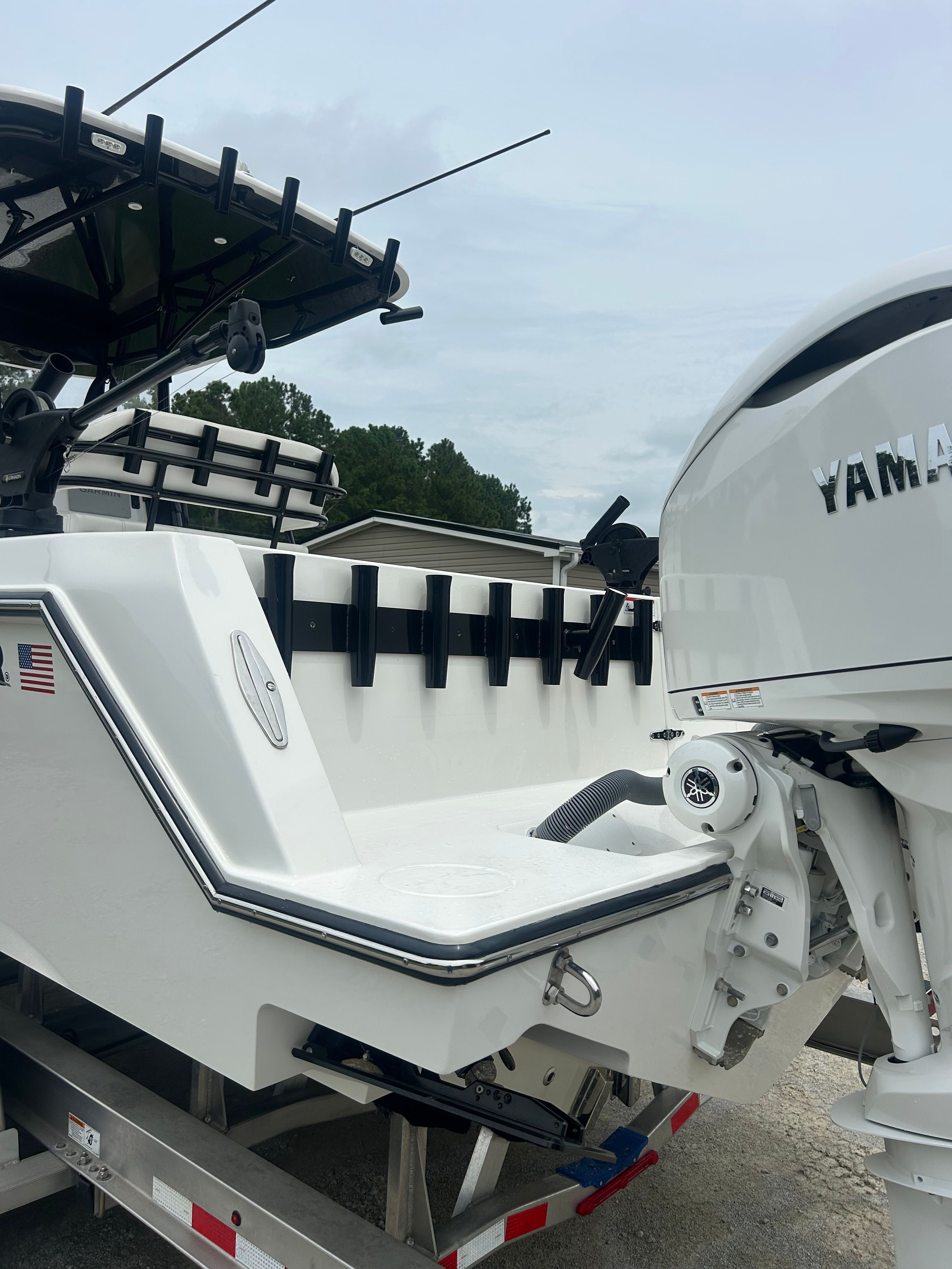 Contender 30 ST from 2023 with Yamaha engine, on a trailer.