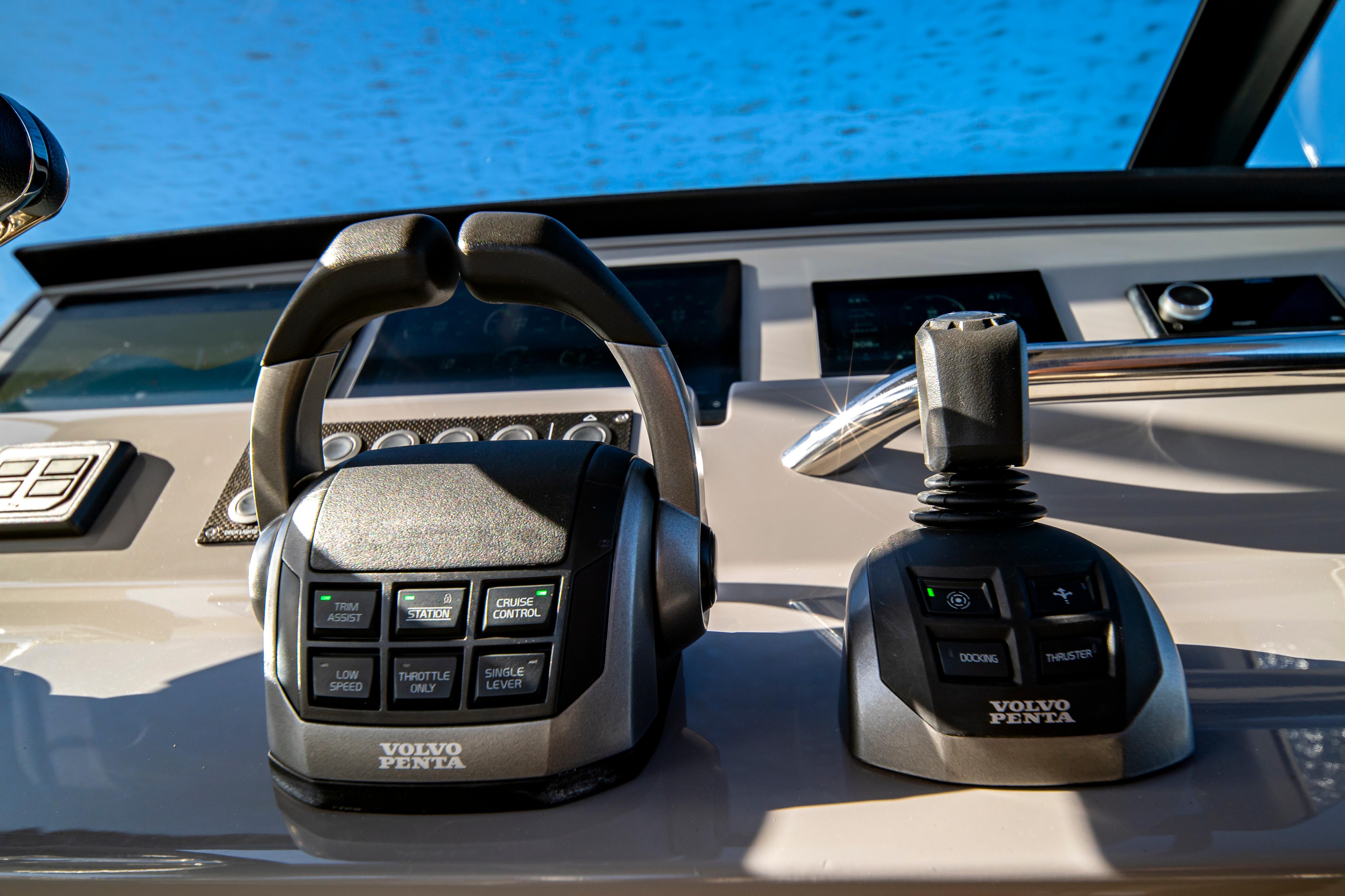 Control panel of 2024 Pardo Yachts P43 with Volvo Penta throttle and joystick.