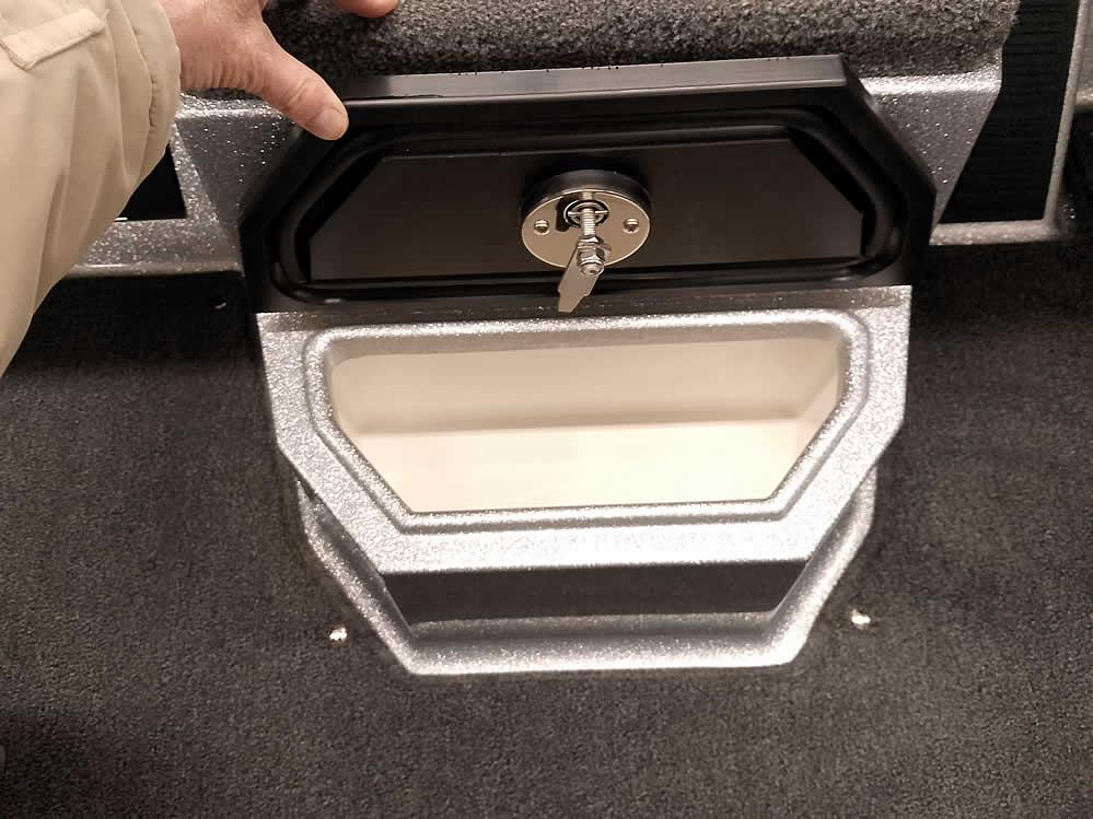 2025 Ranger 1880MS Angler boat storage compartment with lock and key.