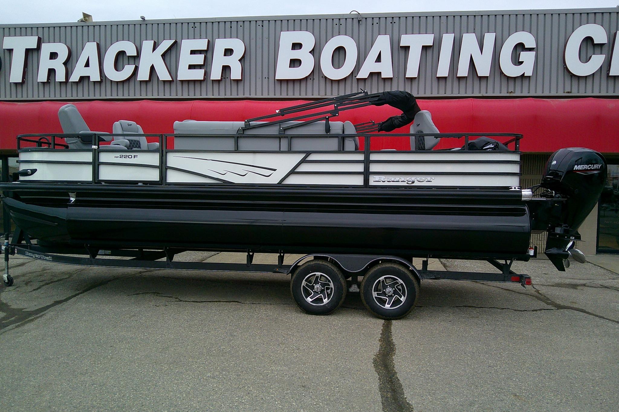 2026 Ranger 220F pontoon boat on trailer at Tracker Boating Center.