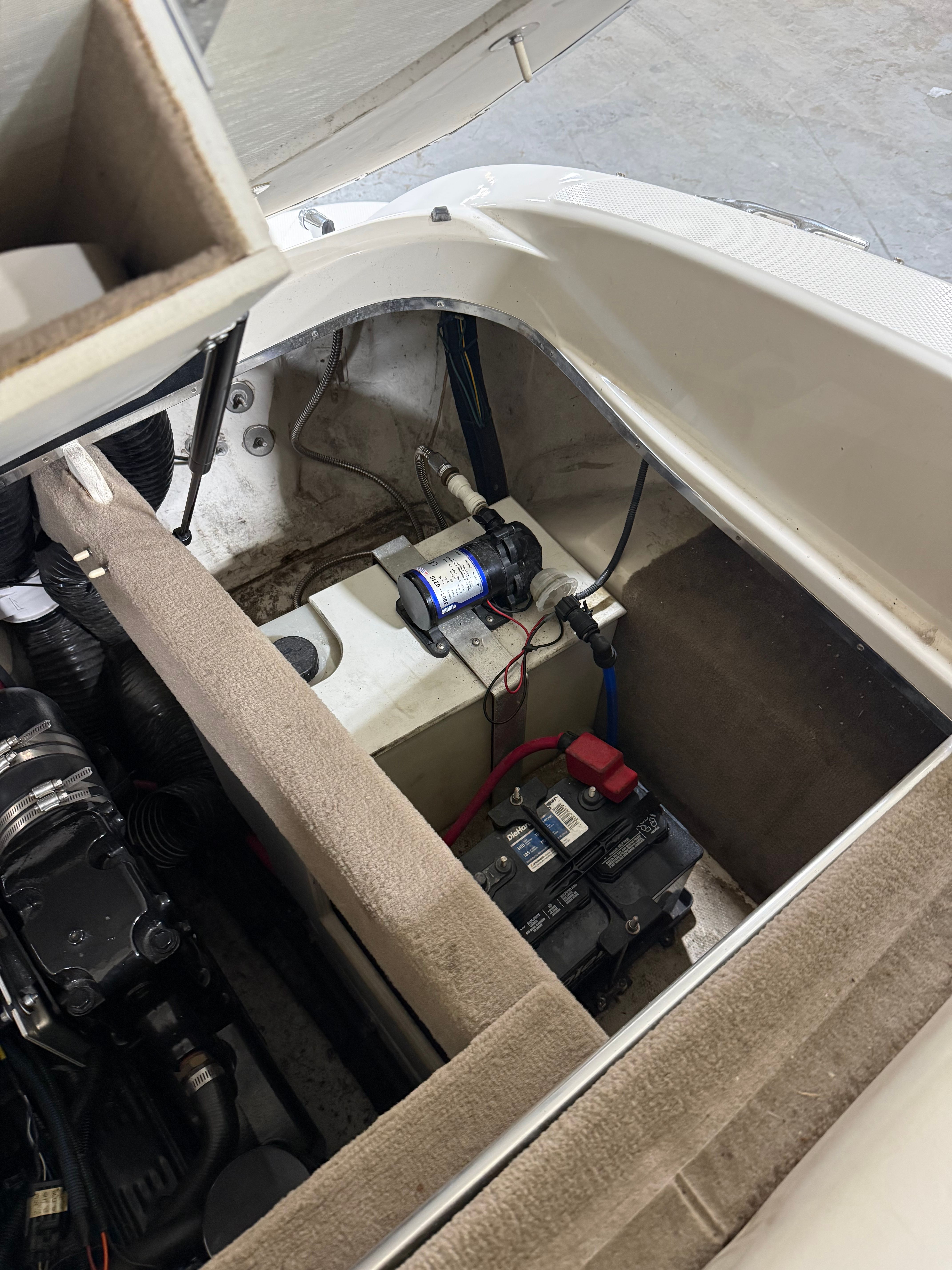 Interior view of a 2003 Sea Ray 240 SIGNATURE boat engine.