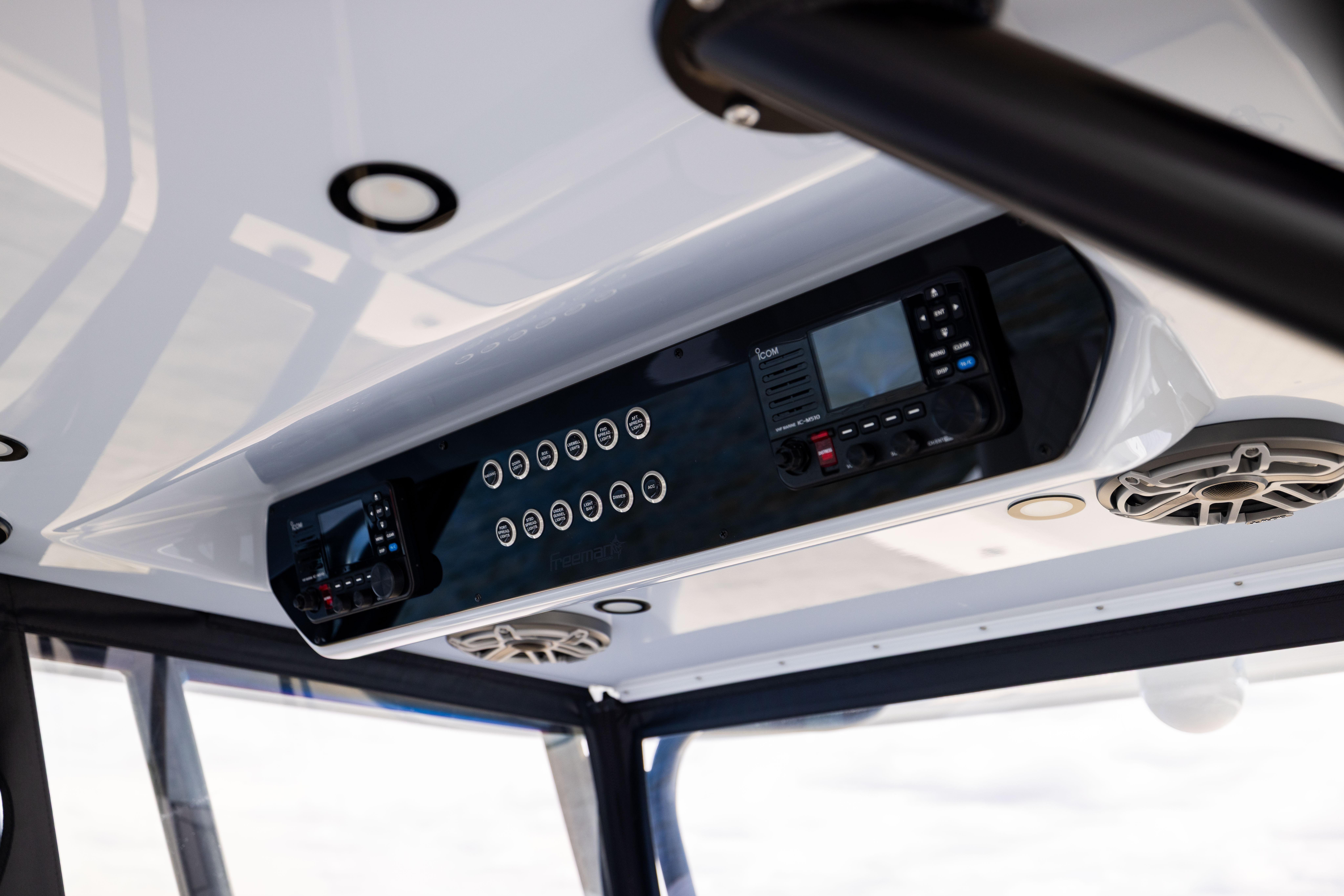 2025 Freeman 42 LR boat console with modern controls and speakers.