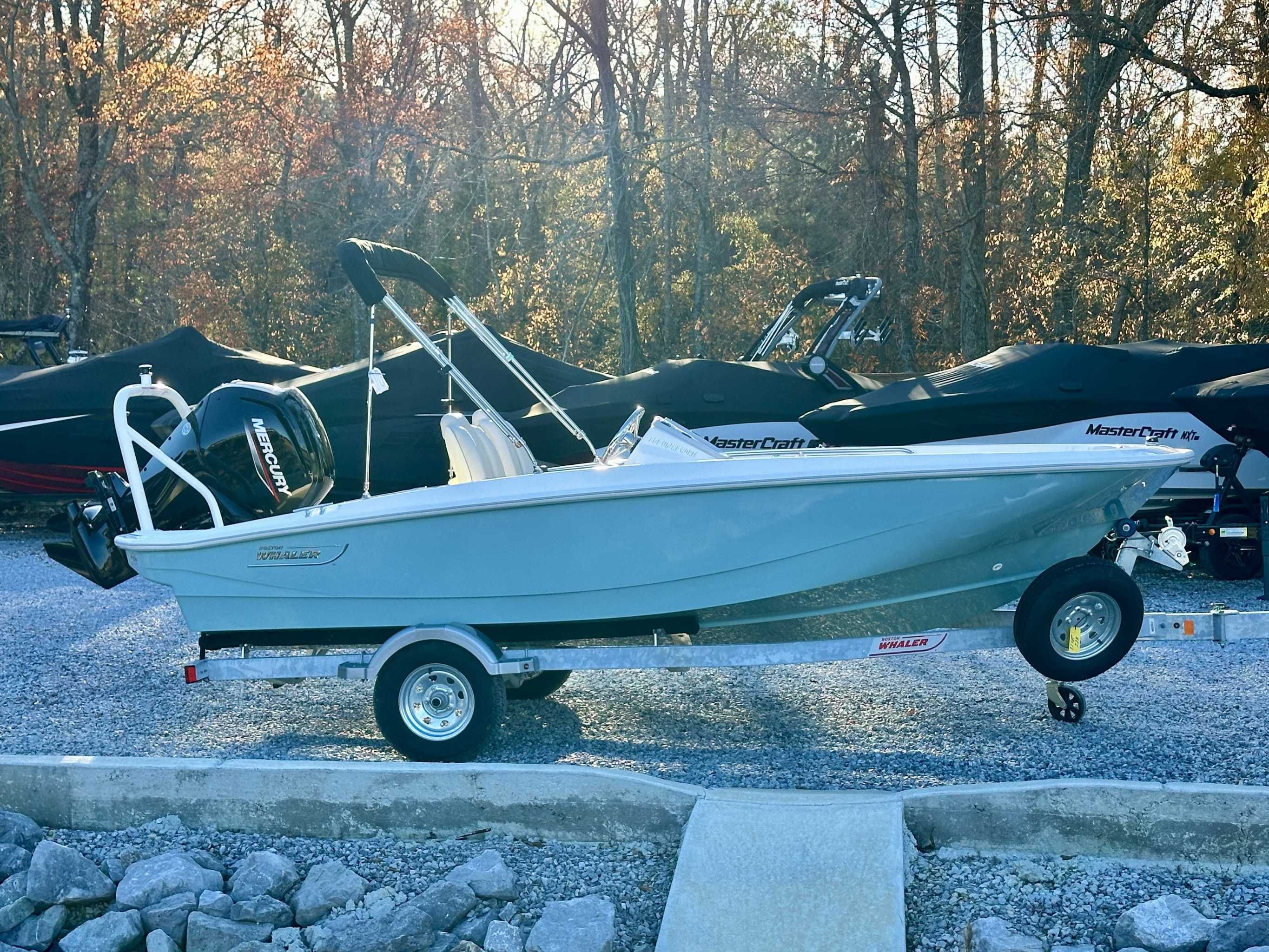 2025 Boston Whaler 160 Super Sport on trailer outdoors.