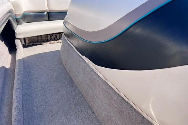 1996 MasterCraft ProStar 190 interior with blue and white upholstery details.