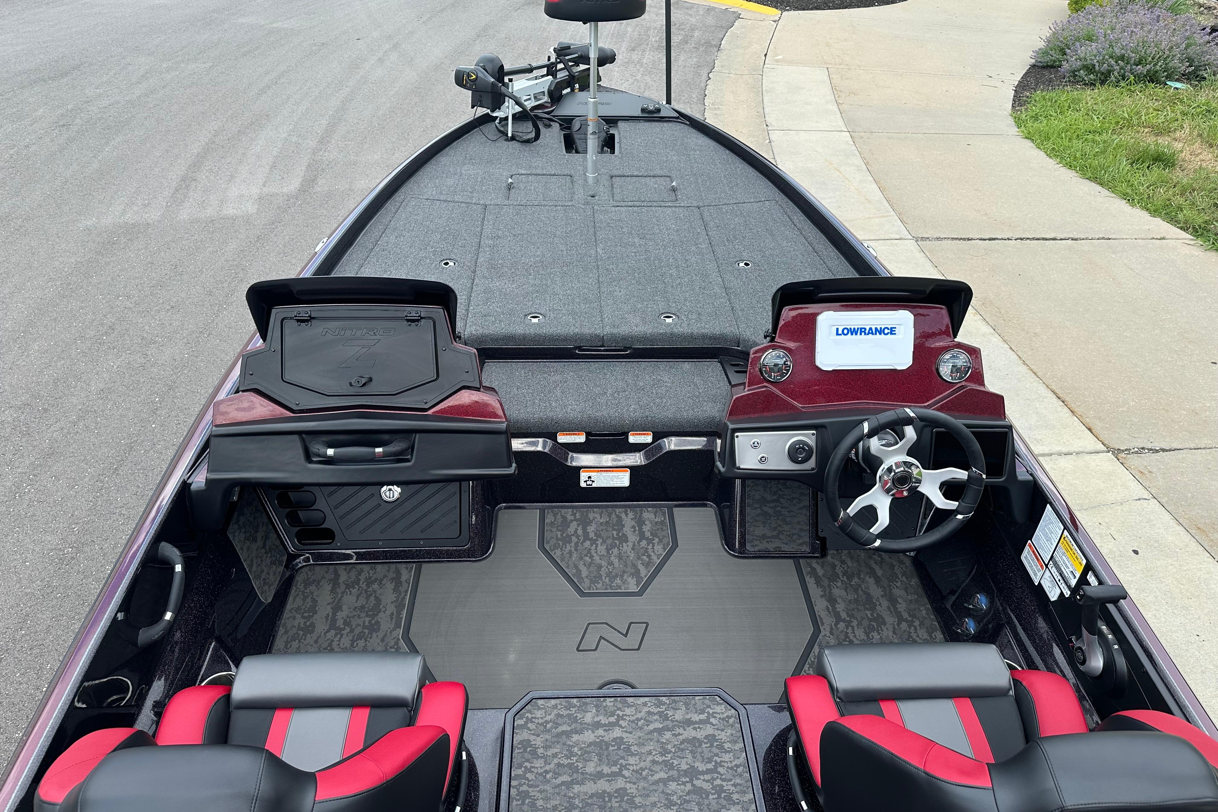 2026 Nitro Z21 XL boat interior with steering wheel and Lowrance display.