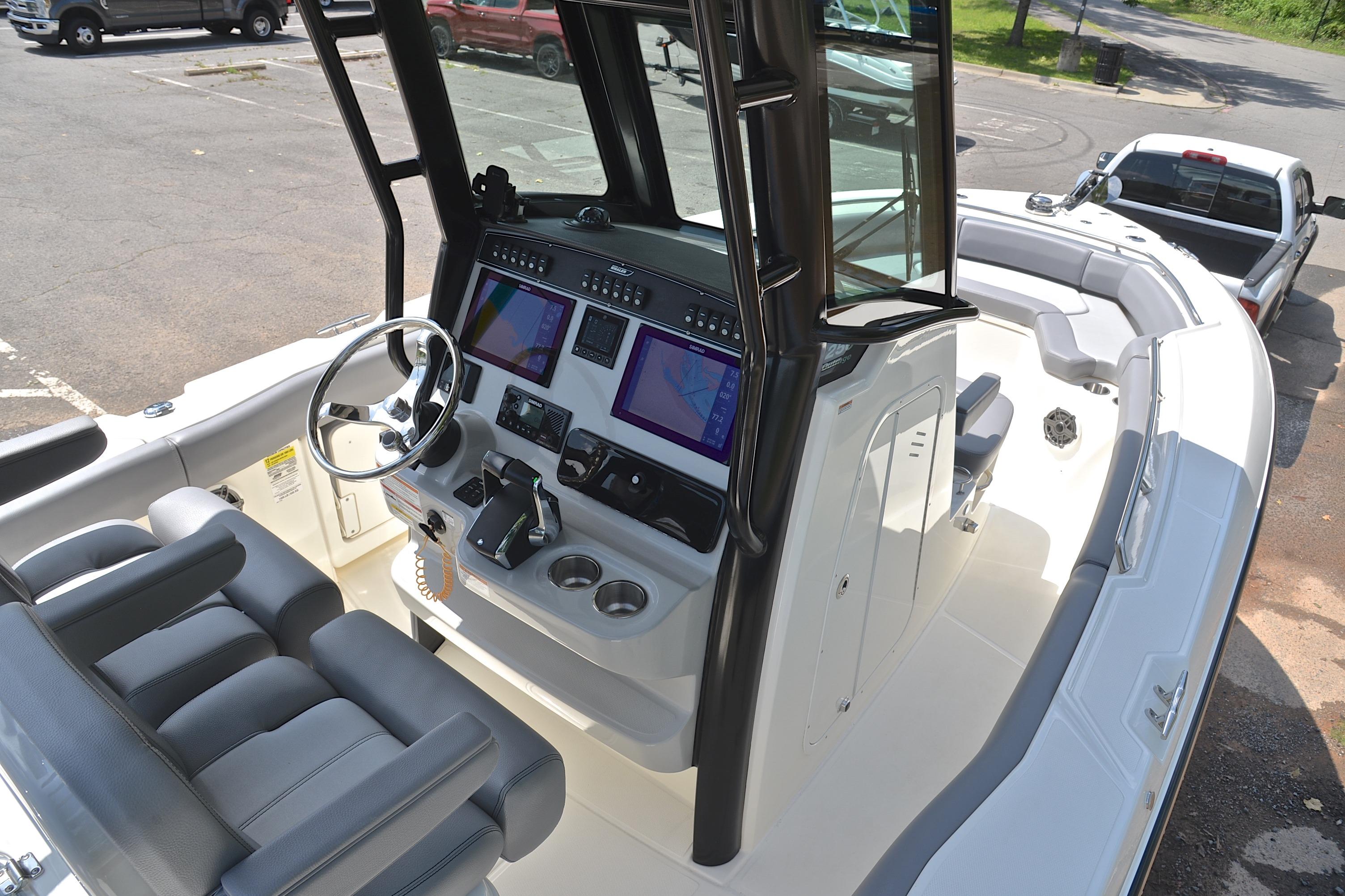 2024 Boston Whaler 250 Outrage boat interior with modern helm and seating.