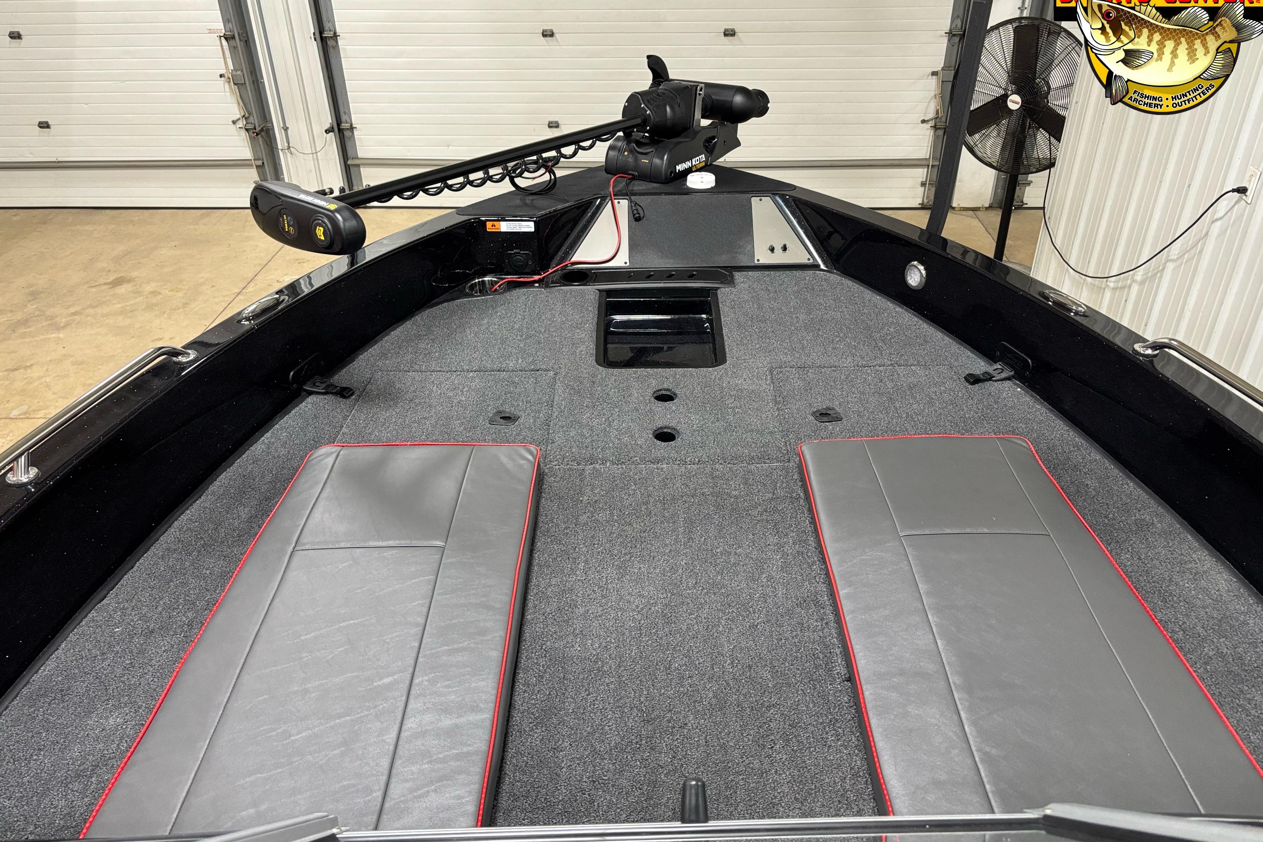 2026 Triton 206 Allure boat interior with gray seating and trolling motor.