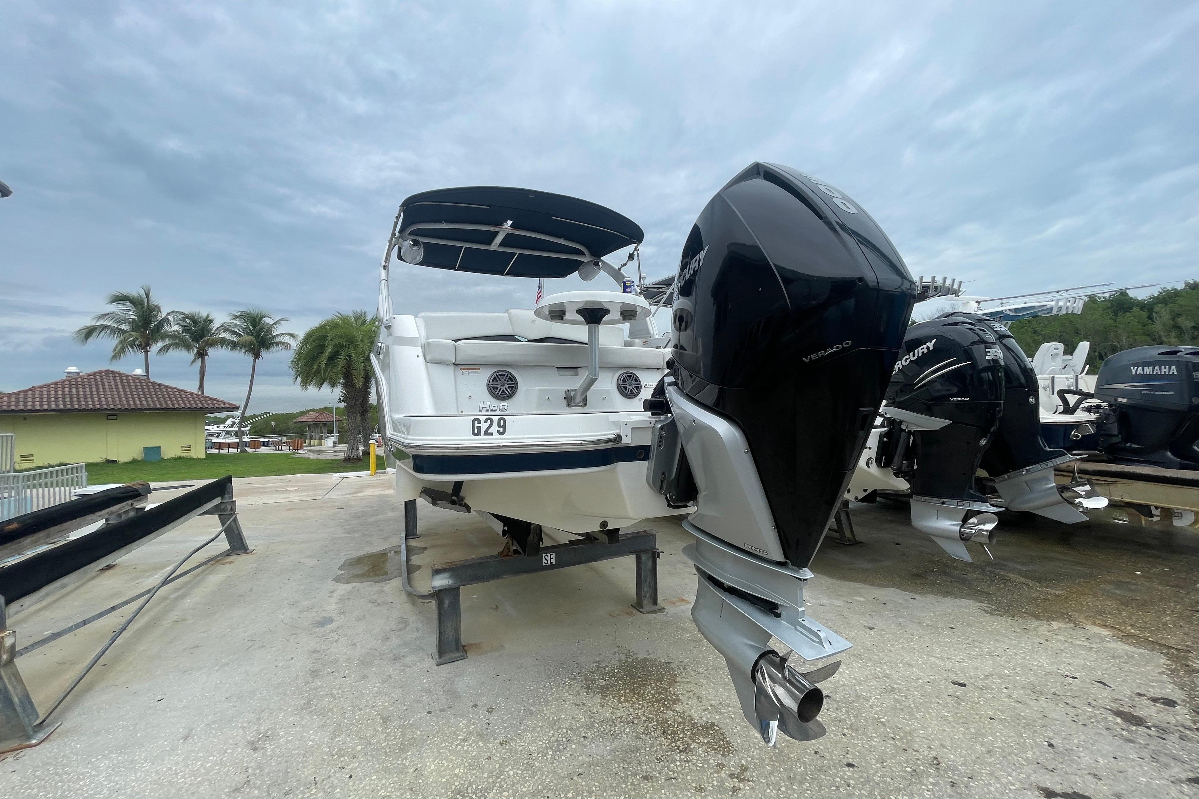 2022 Four Winns HD8 OB boat with Mercury outboard engine on a trailer.