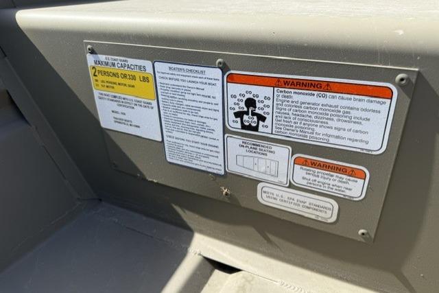 2026 Tracker Grizzly 10 Jon boat capacity and safety warning labels.