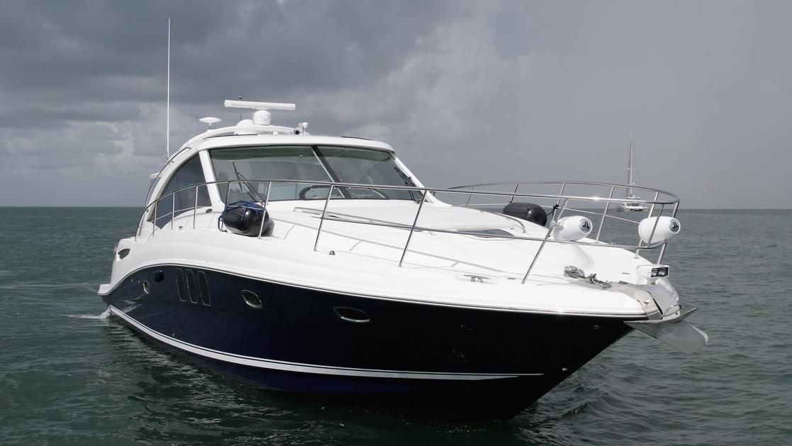 2008 Sea Ray 480 Sundancer yacht on open water under cloudy skies.