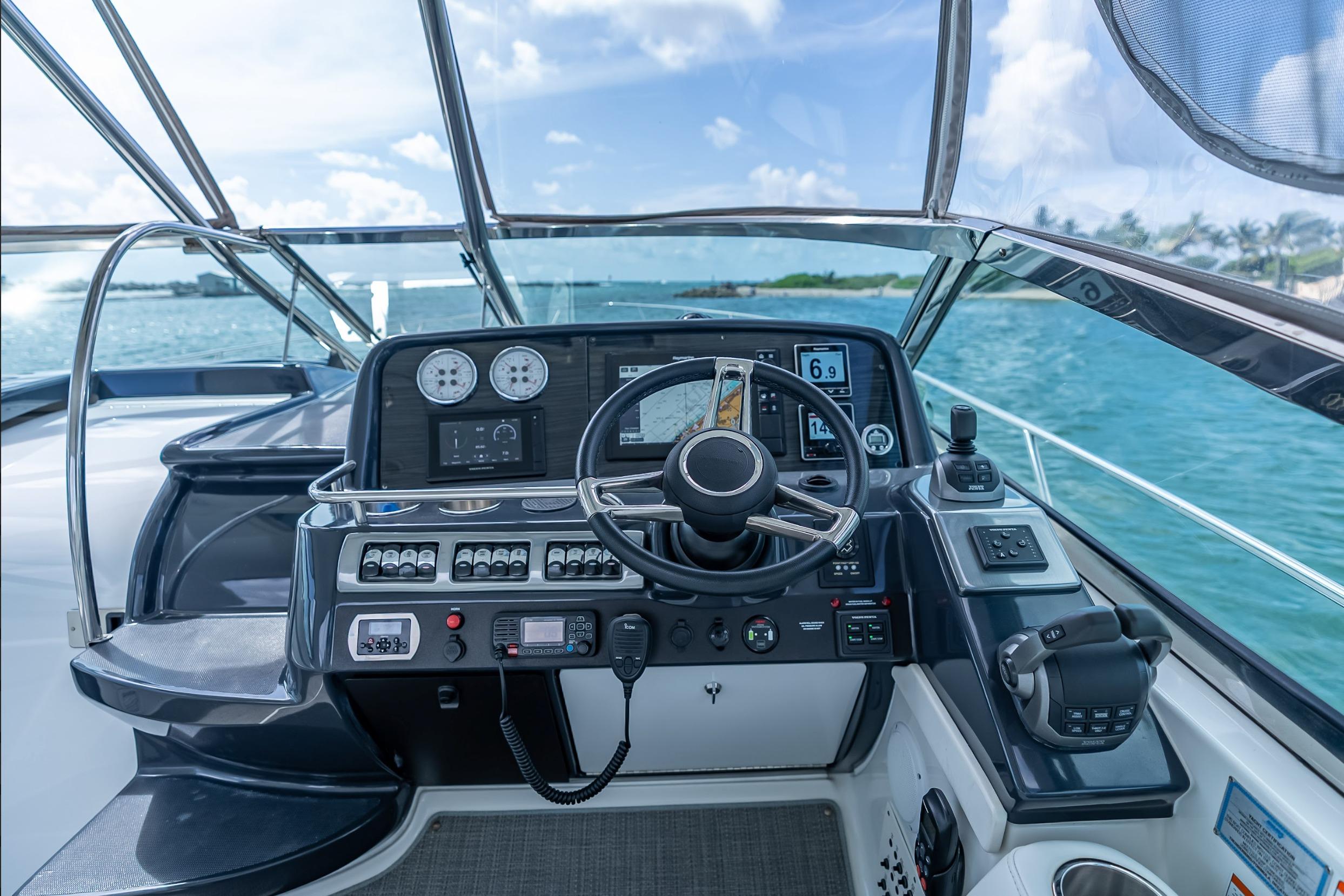 2022 Formula 40 Performance Cruiser helm with advanced navigation controls on open water.