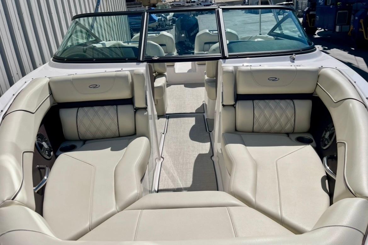 Luxurious interior of 2025 Regal LX2 boat with plush seating and elegant design.