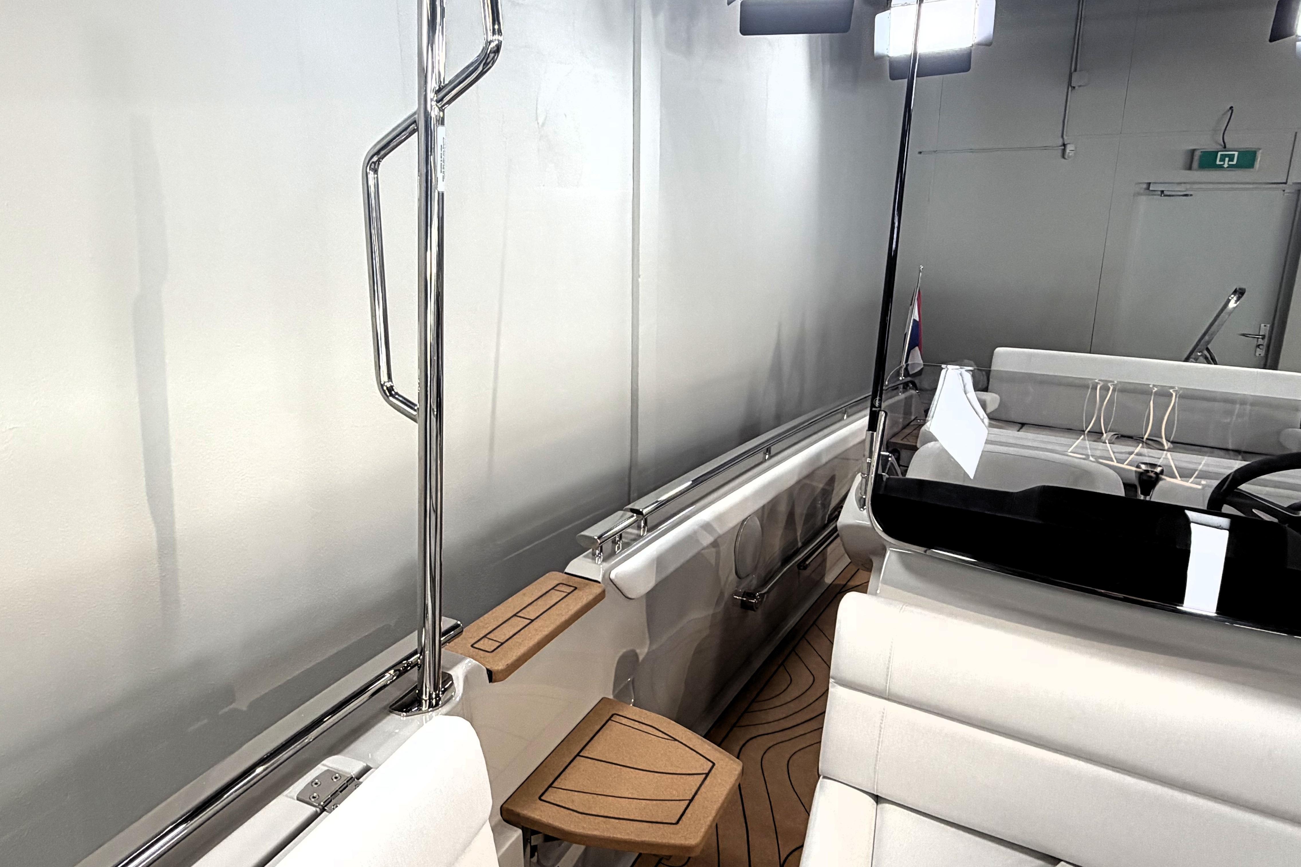 Modern Evene Origin 71 boat interior, featuring sleek design and comfortable seating, 2026 model.