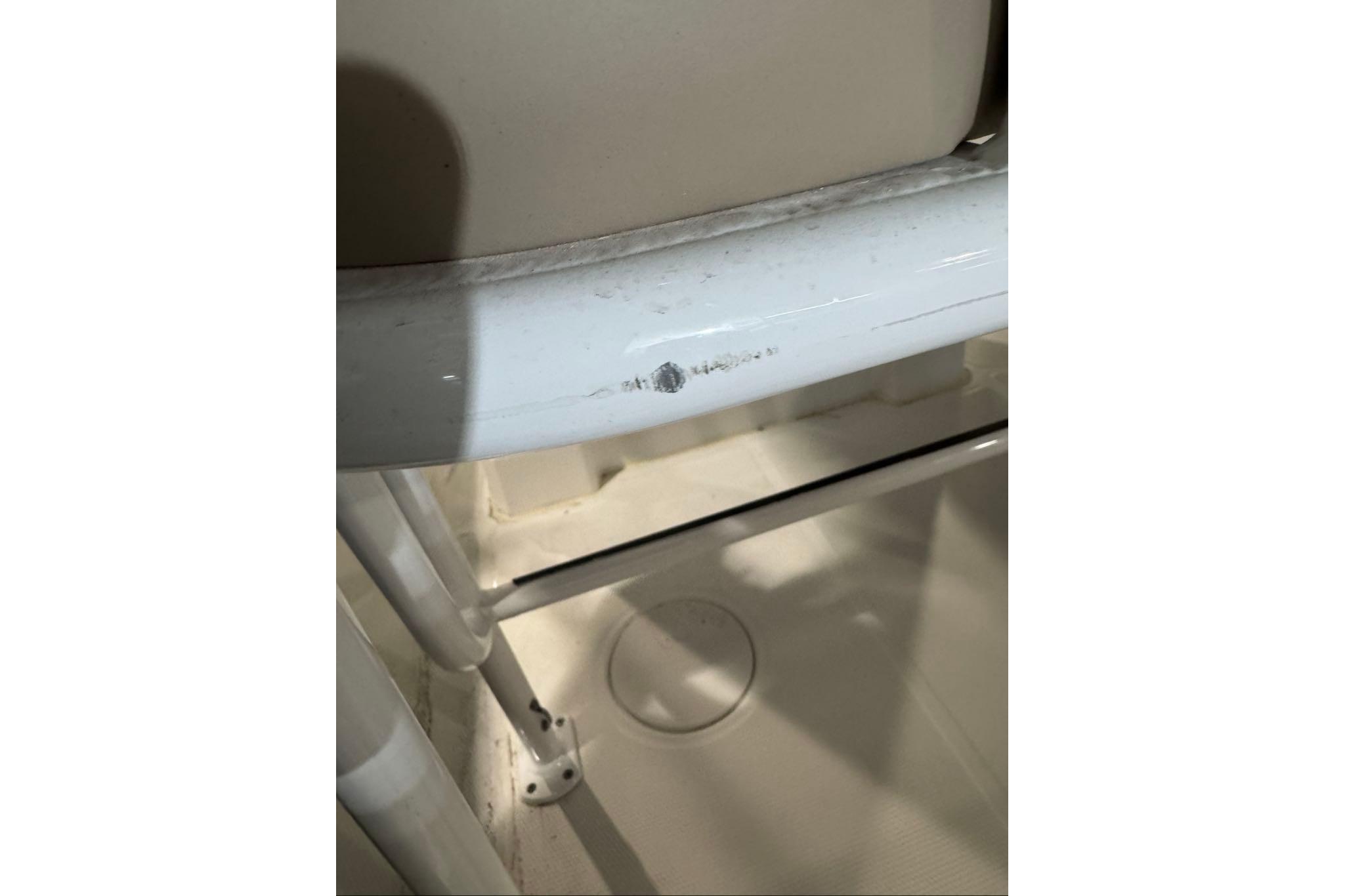 Close-up of a 2026 Tahoe 2150 CC boat interior, showing white metal framework.