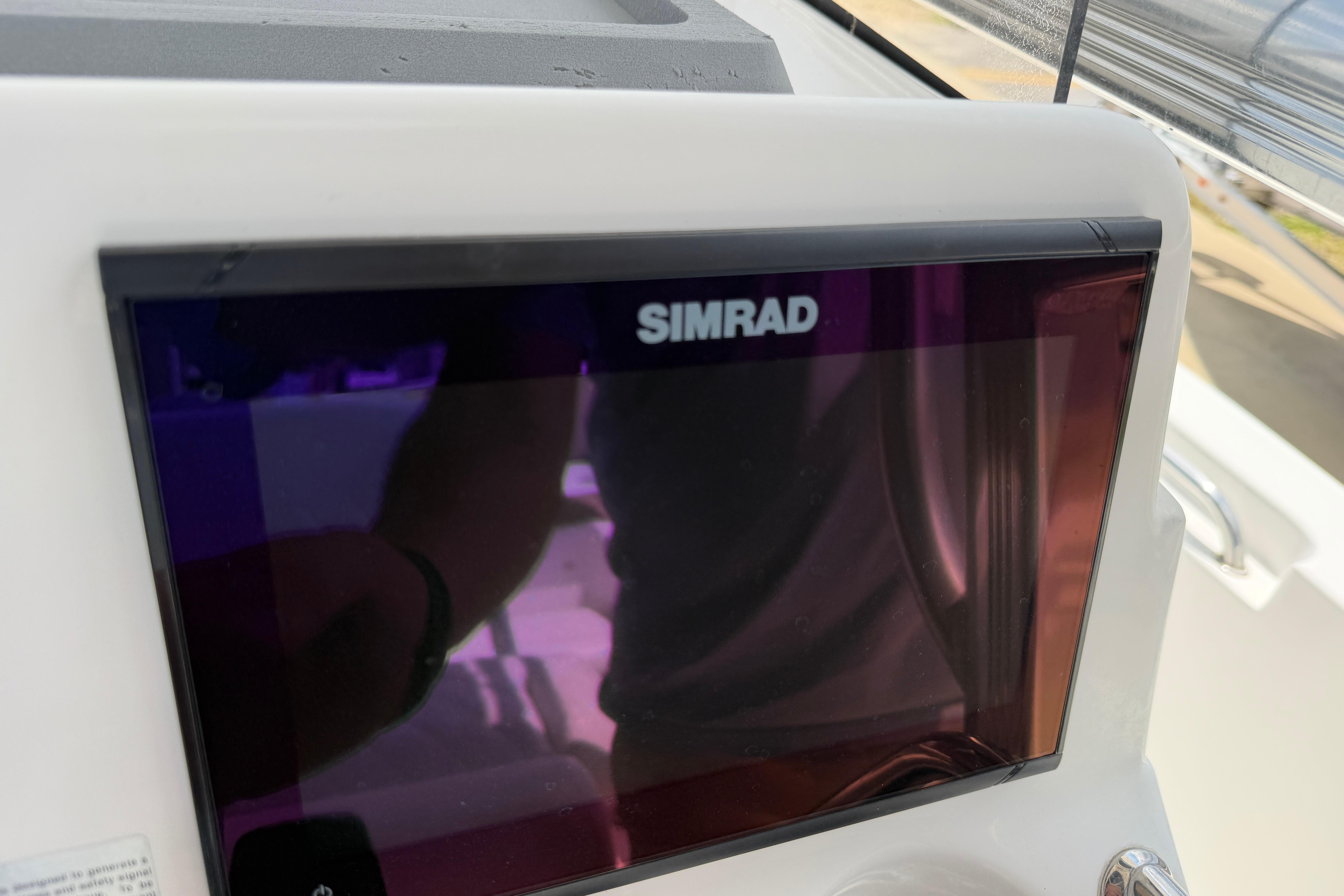 Simrad display on 2015 Sea Hunt Triton 225 boat dashboard.