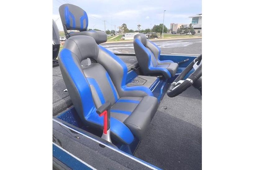 2026 Nitro Z19 XL boat interior with blue and gray seats, showcasing modern design.