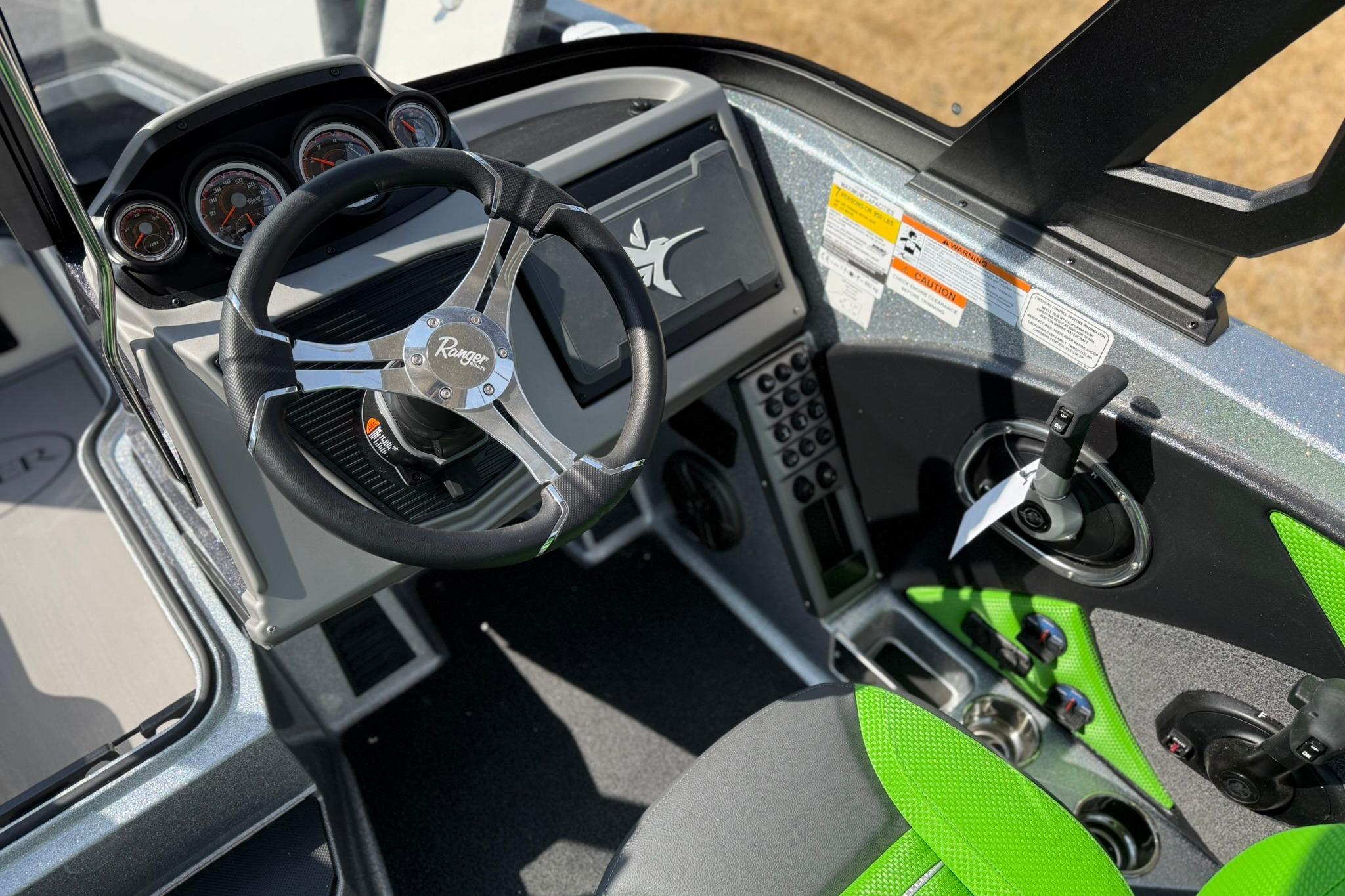 2026 Ranger 1880MS boat cockpit with steering wheel and control panel.