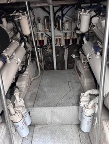Engine room of 1986 Egg Harbor 60 Sportfisherman with visible machinery and components.