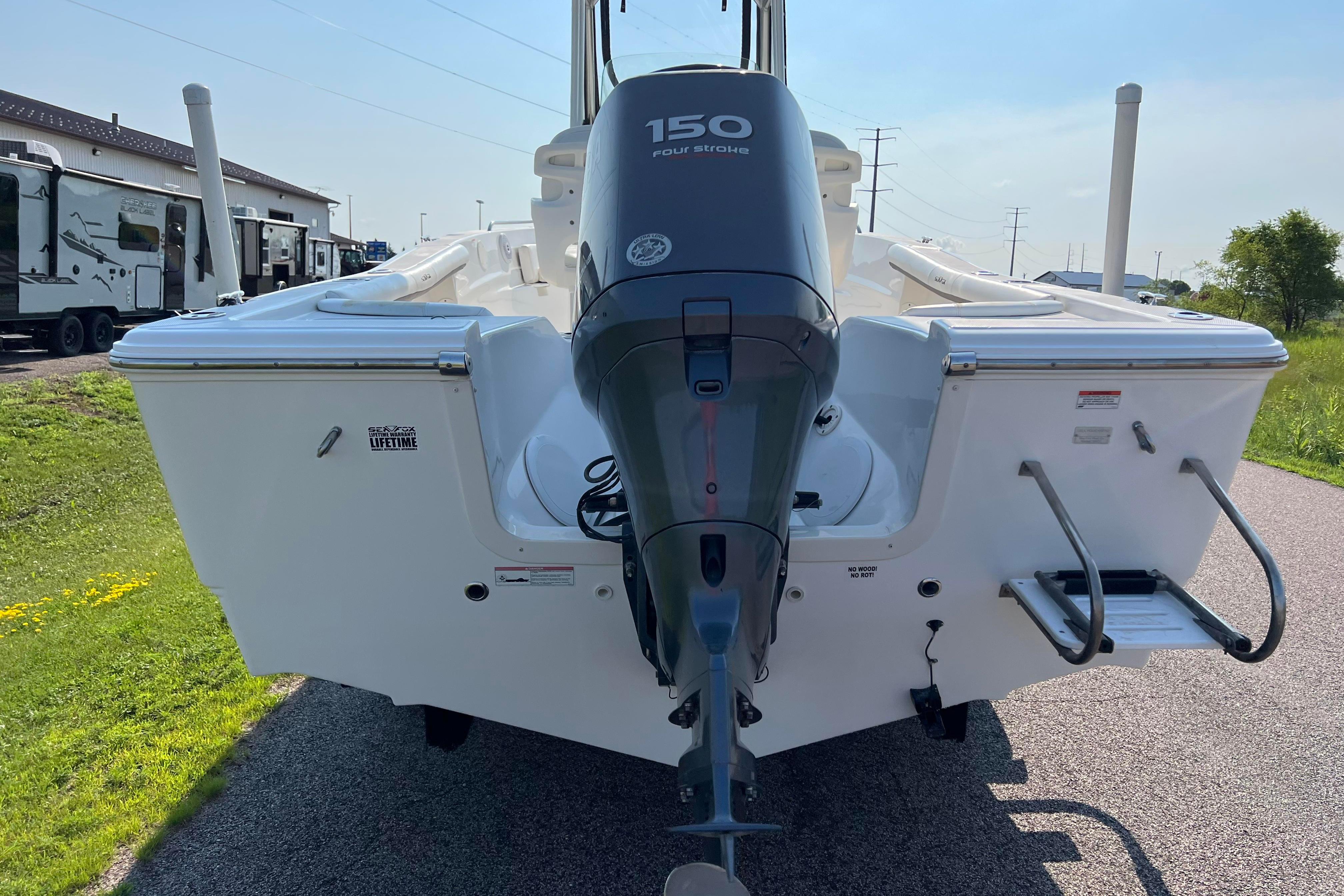 2012 Sea Fox 206 Center Console boat with 150 horsepower outboard motor.